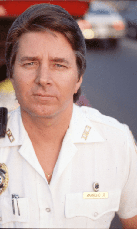 An undated portrait of Bobby Sherman, dressed in a white EMS uniform | Photo: Getty Images