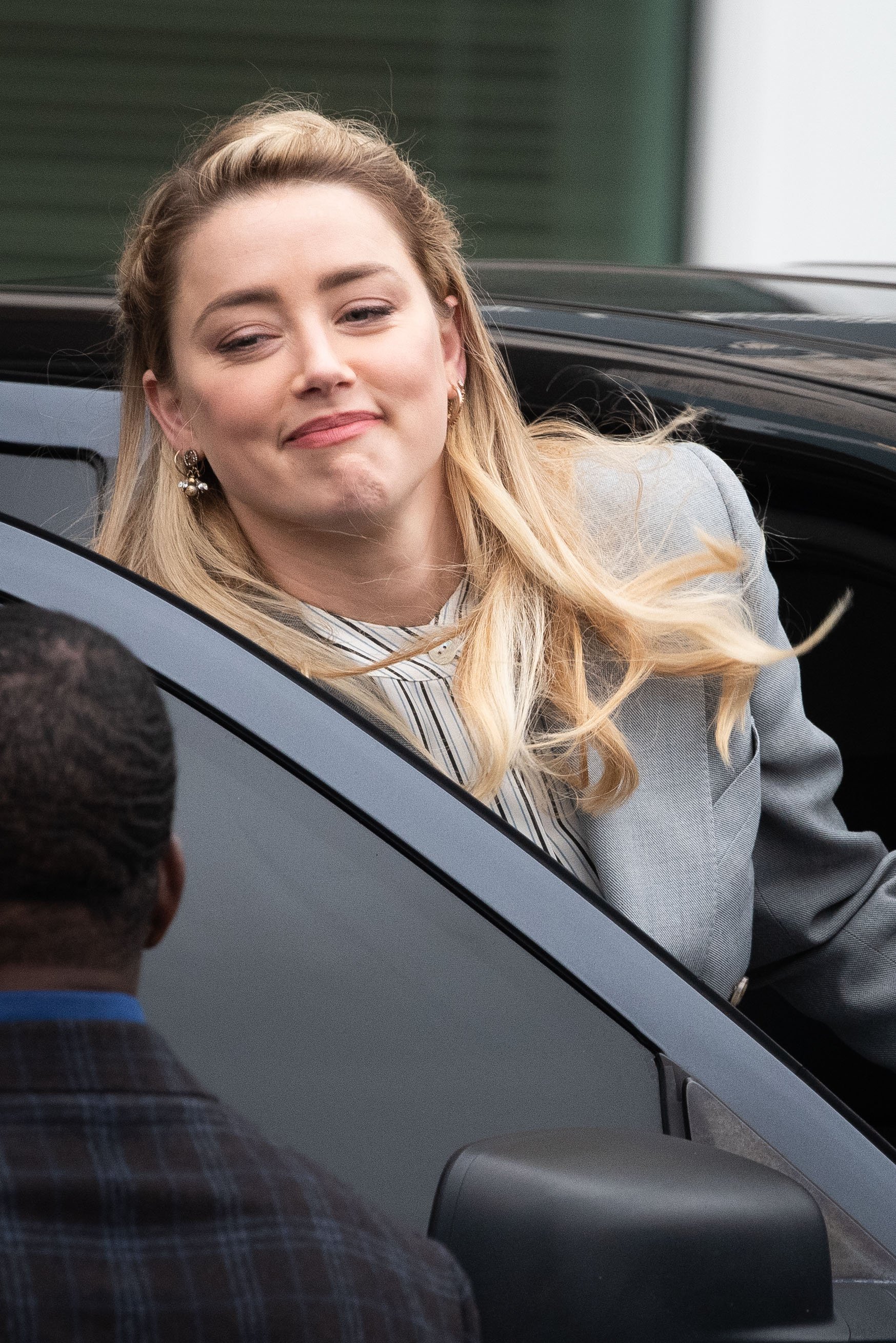  Amber Heard leaves court during the civil trial at Fairfax County Circuit Court on May 27, 2022, in Fairfax, Virginia | Source: Getty Images