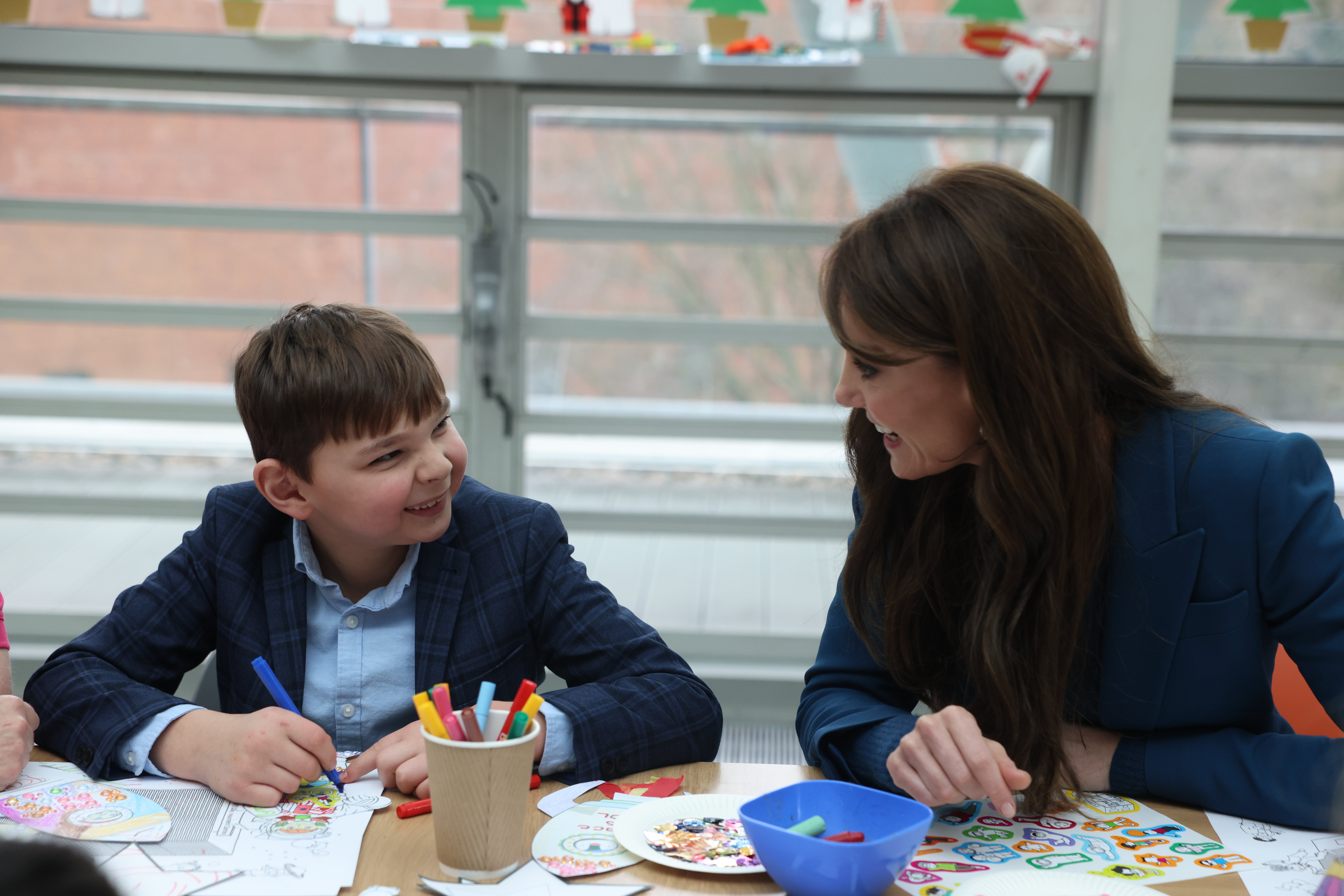 Tony Hudgell with Catherine, Princess of Wales, during the opening event of Evelina London's children's day surgery unit on 5 December 2023 in London, England. | Source: Getty Images