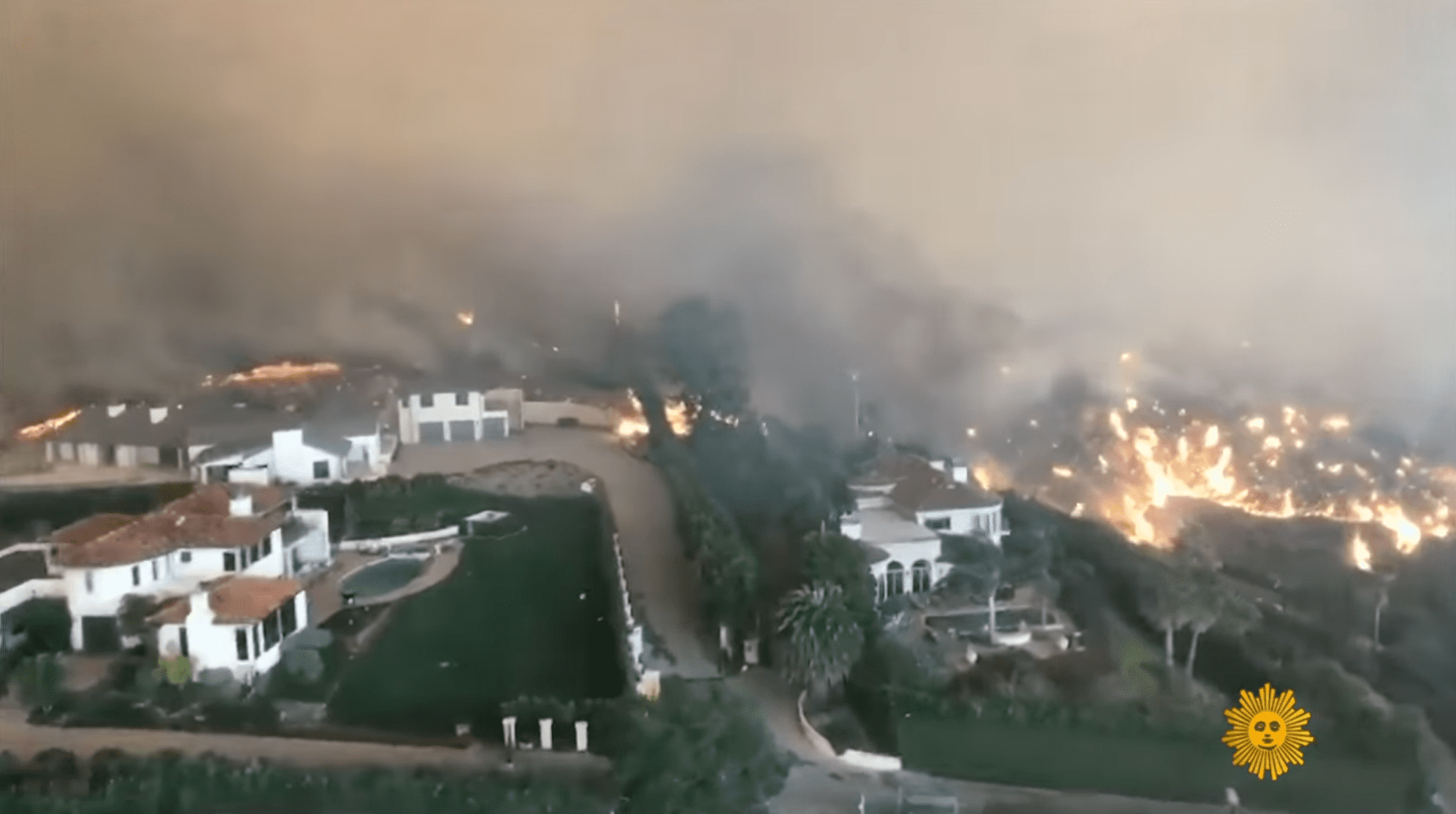 An image of Sam Elliott's family house being burnt down. | Source: YouTube/CBS Sunday Morning