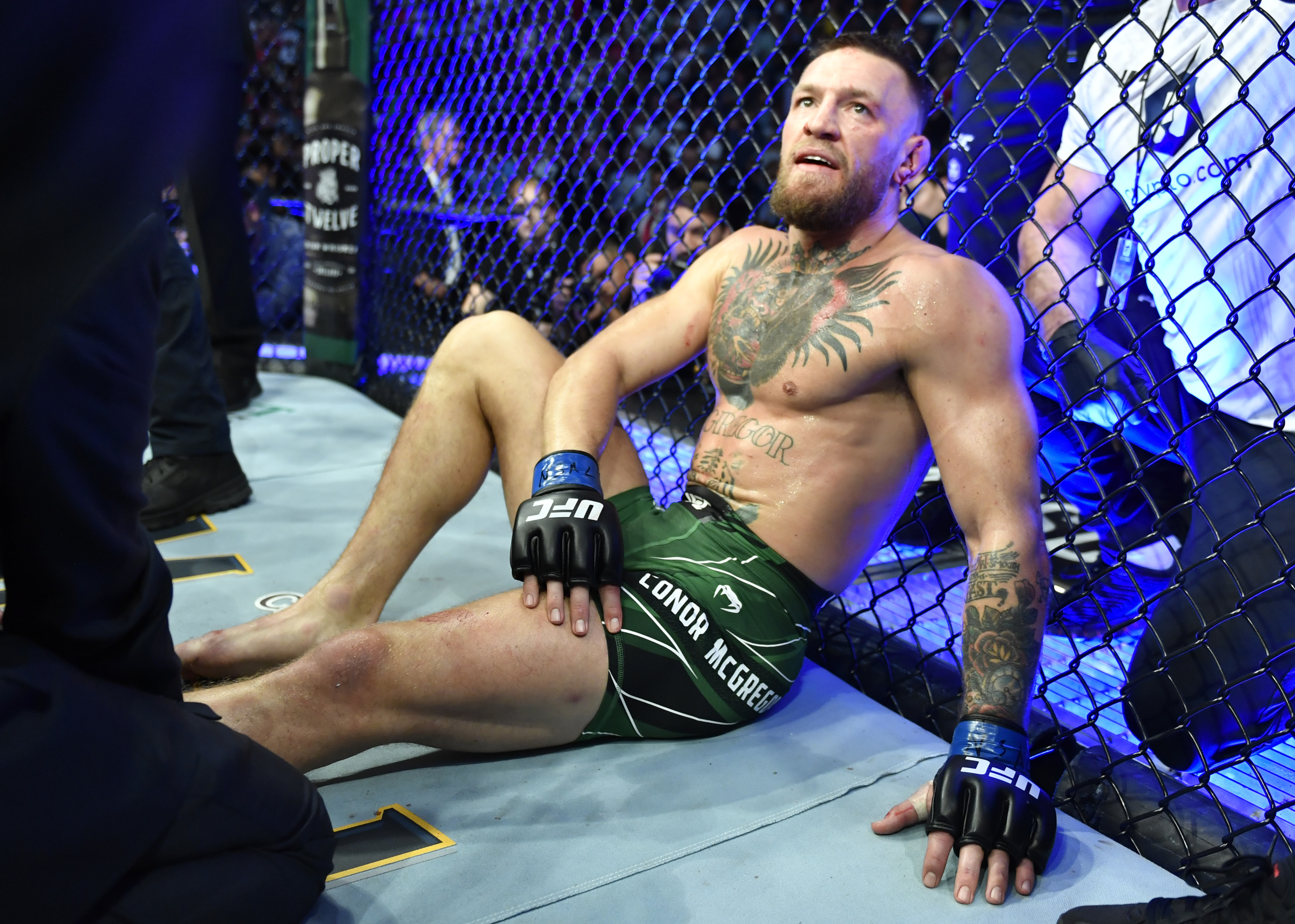 Conor McGregor of Ireland reacts after his TKO loss due to injury against Dustin Poirier during the UFC 264 event at T-Mobile Arena on 10 July 2021 in Las Vegas, Nevada. | Source: Getty Images