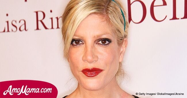 Tori Spelling, 44, shares a sweet photo of herself kising second youngest son Finn, 5