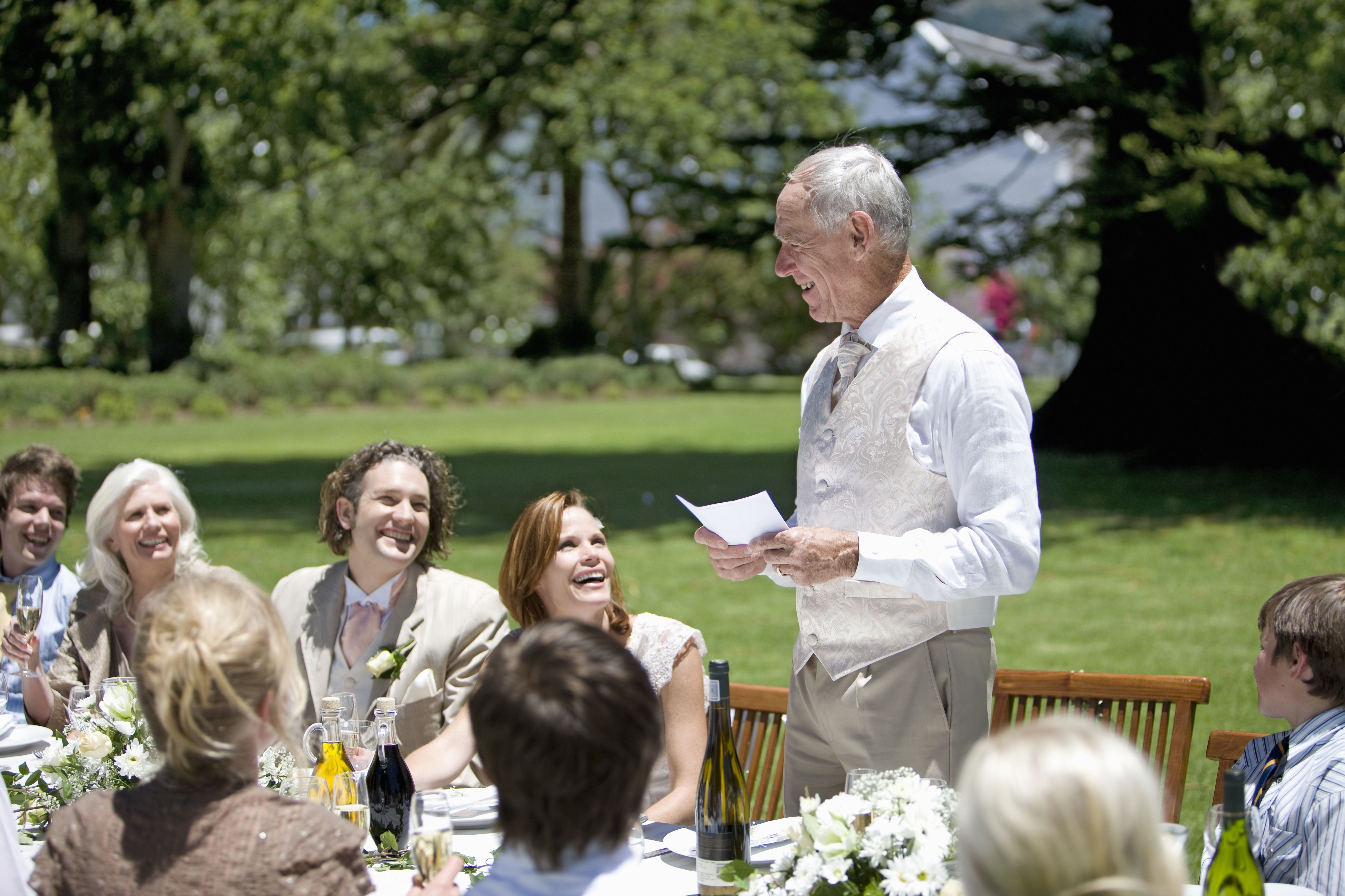 A man gives a speech during a wedding ceremony. | Source: Shutterstock