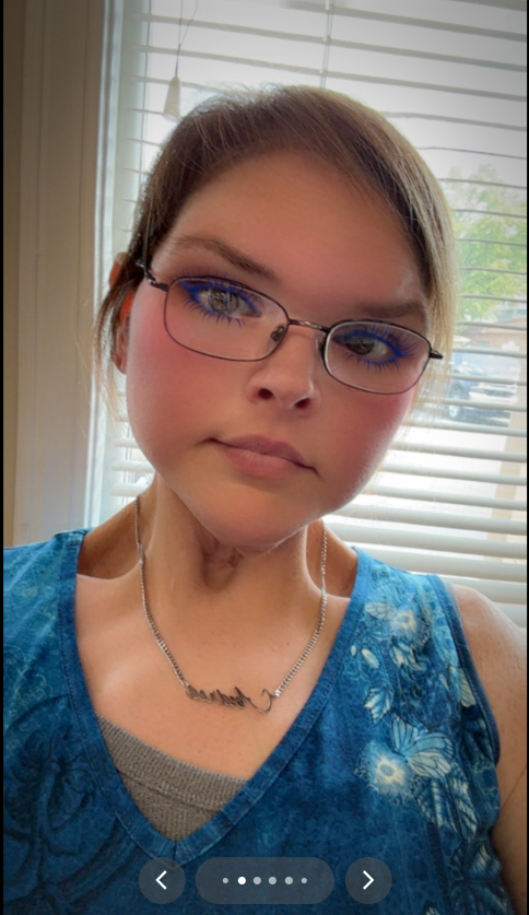 Tammy Slaton looks radiant in a blue blouse and glasses, from a video post dated July 21, 2025 | Source: TikTok/tammy.l.slaton
