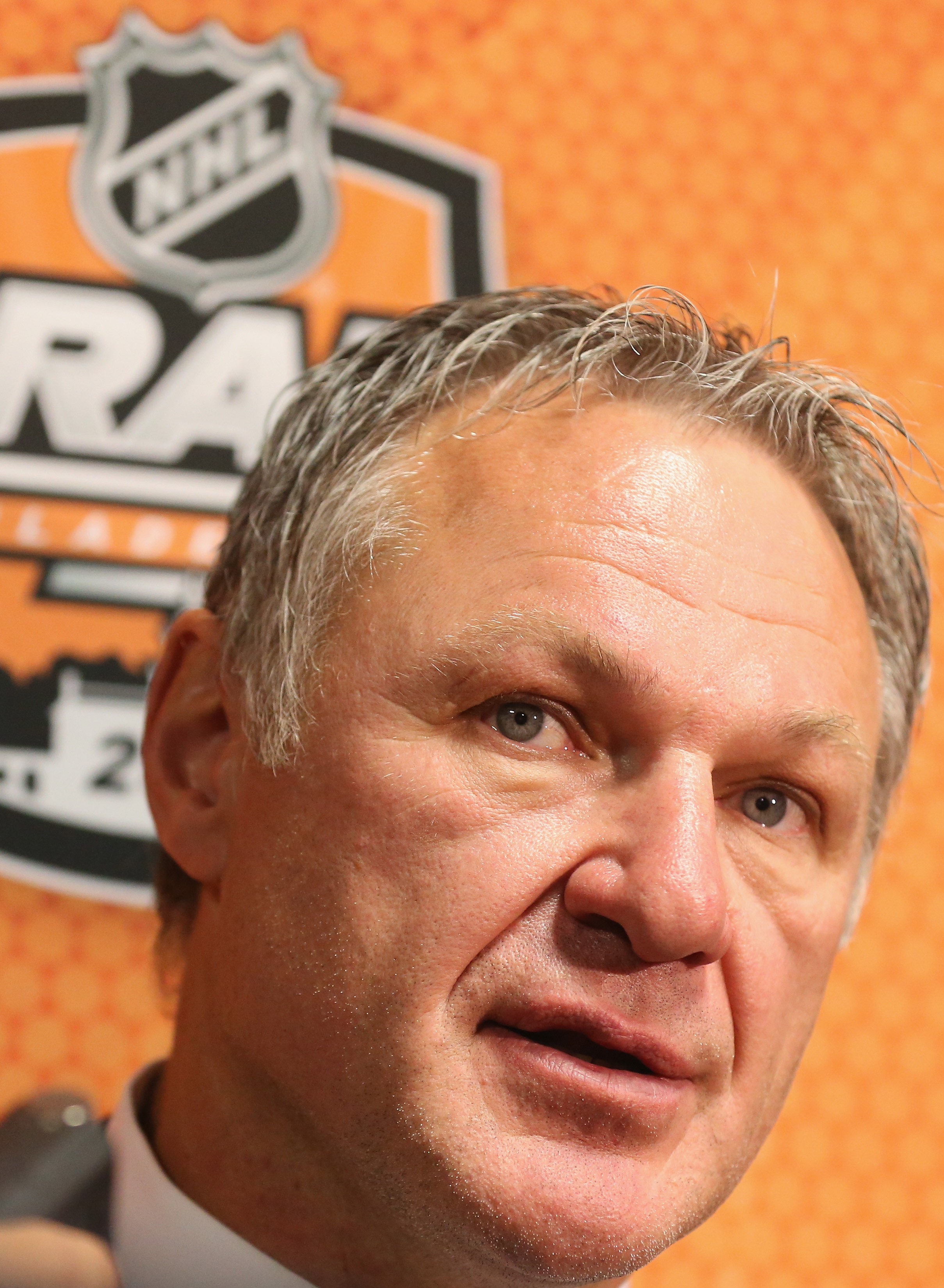 Claude Lemieux, years later and looking more mature, speaks to the media on Day Two of the NHL Draft at the Wells Fargo Center on June 28, 2014, in Philadelphia, Pennsylvania | Source: Getty Images