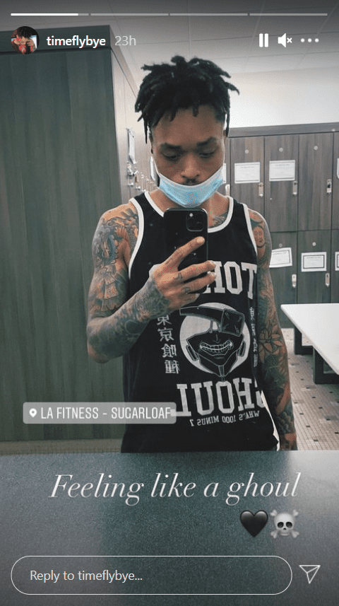 Tron Austin shows off his tattoos in a mirror selfie on his Instagram story. | Photo: Instagram/timeflybye