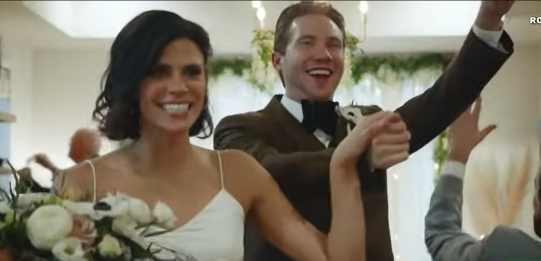 Spencer and Monique Tepe during their wedding, held inside their home, seen in a video dated January 7, 2025 | Source: YouTube/@CBSEveningNews