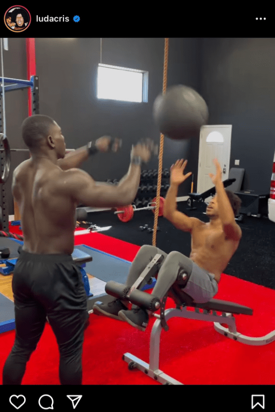 Ludacris performs a workout routine with the aid of a gym coach. | Photo: Instagram.com/ludacris