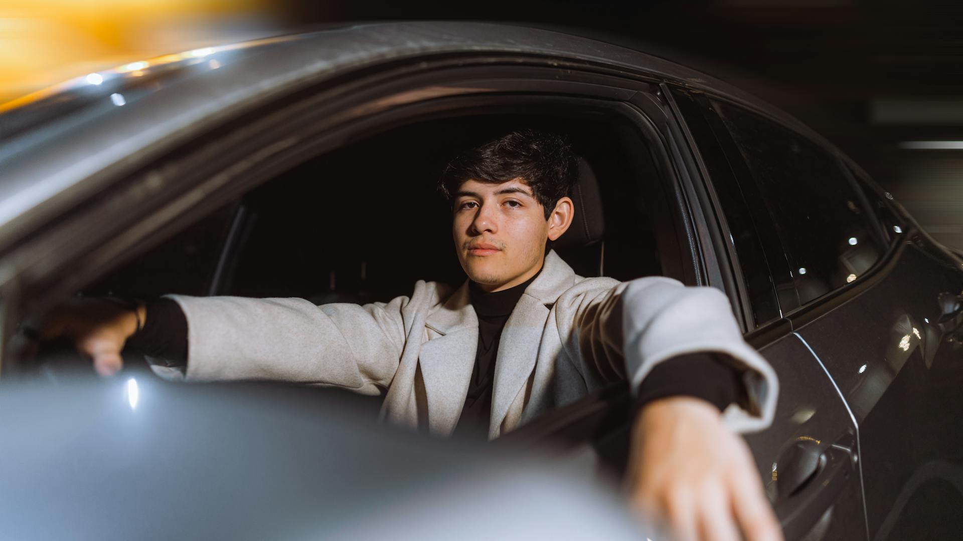 A young man in a car | Source: Pexels