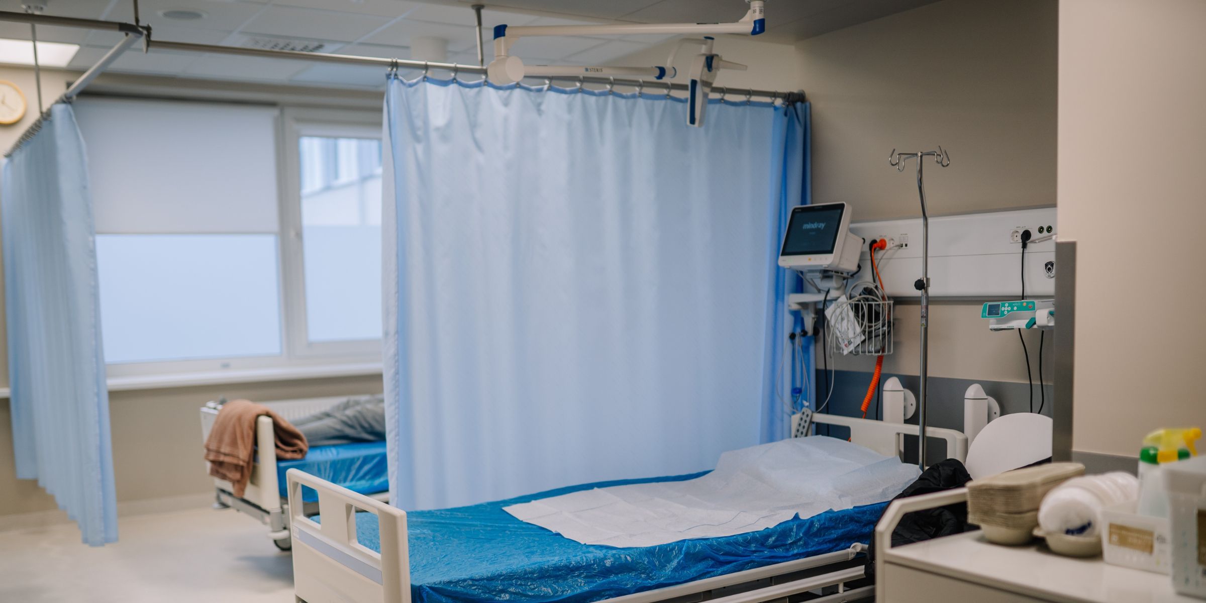 Empty hospital beds in a ward | Source: Shuttersock