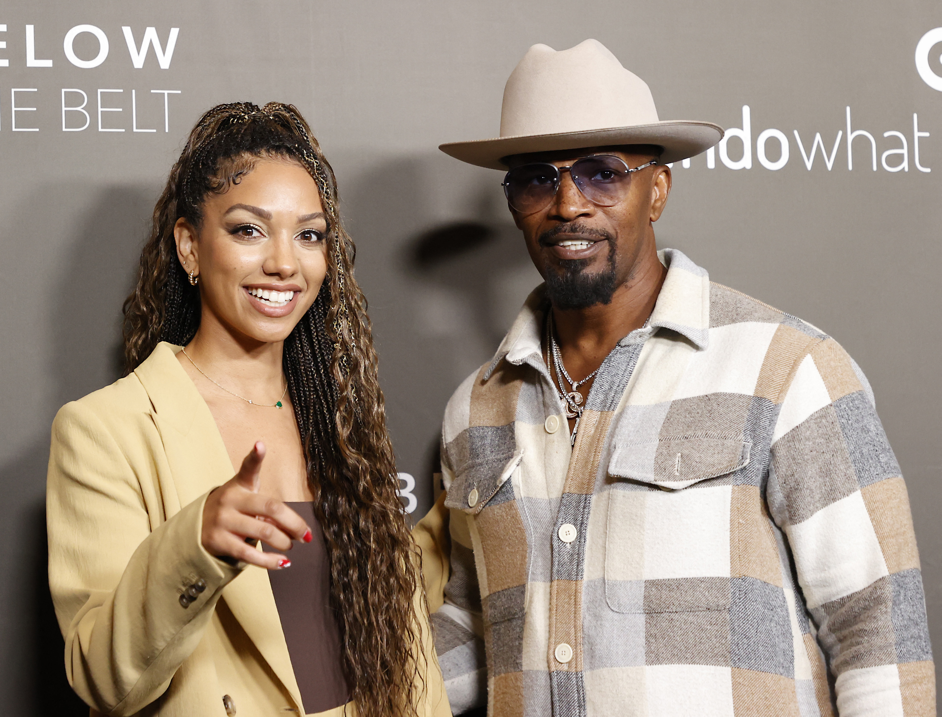 US actor Jamie Foxx and his daughter US producer Corinne Foxx arrive for the Los Angeles premiere of "Below the Belt" at the Directors Guild of America in Los Angeles, October 1, 2022 | Source: Getty Images