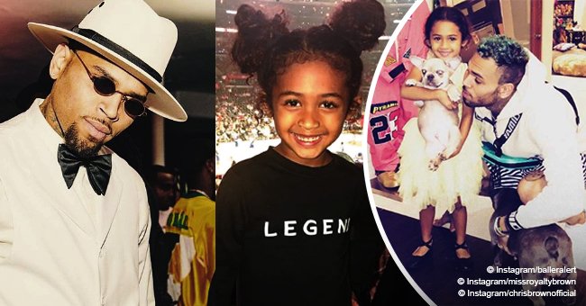 Chris Brown dotes on his daughter Royalty playing with puppies in heartwarming pic