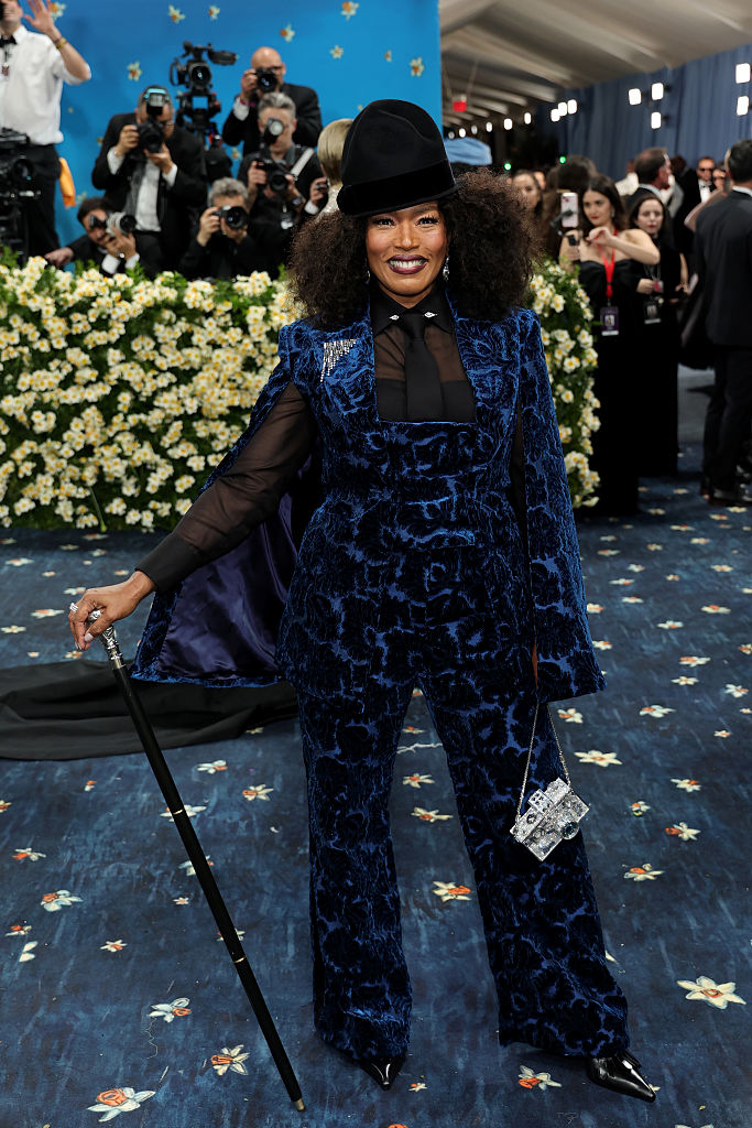 At the 2025 Met Gala on May 5, Angela Bassett arrived at the Metropolitan Museum of Art in New York City for an evening themed "Superfine: Tailoring Black Style."