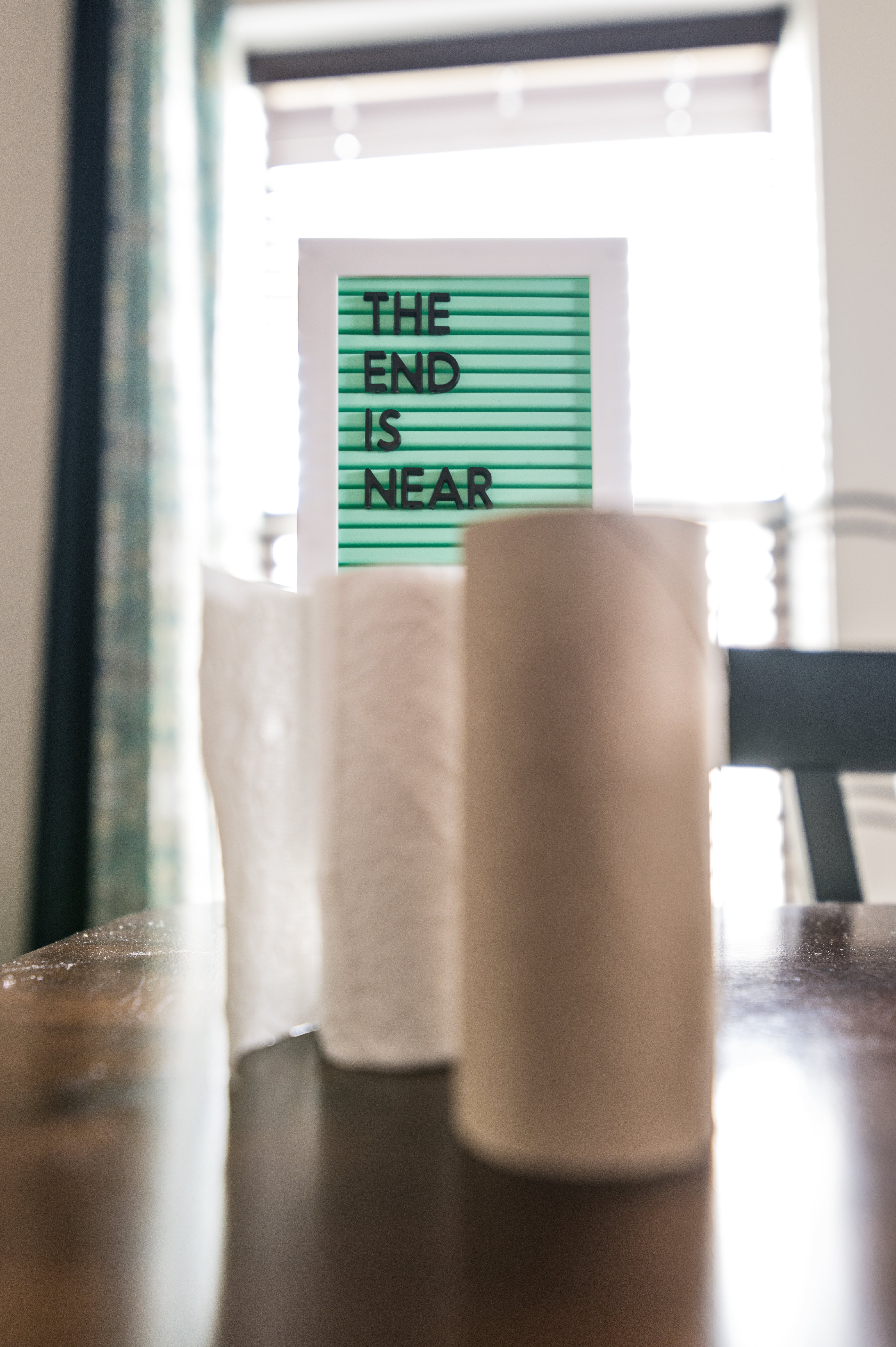 Rolls of paper towels on a table. | Source: Pexels