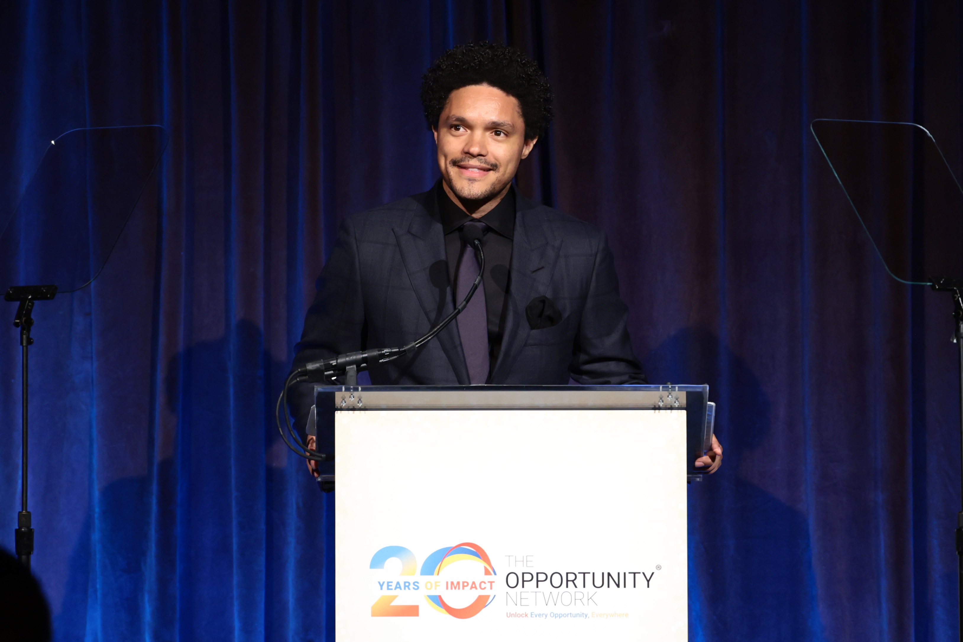 Trevor Noah speaking during "The Opportunity Network celebrates 20-year anniversary with Annual Night of Opportunity" Gala on May 3, 2023. in New York City. | Source: Getty Images