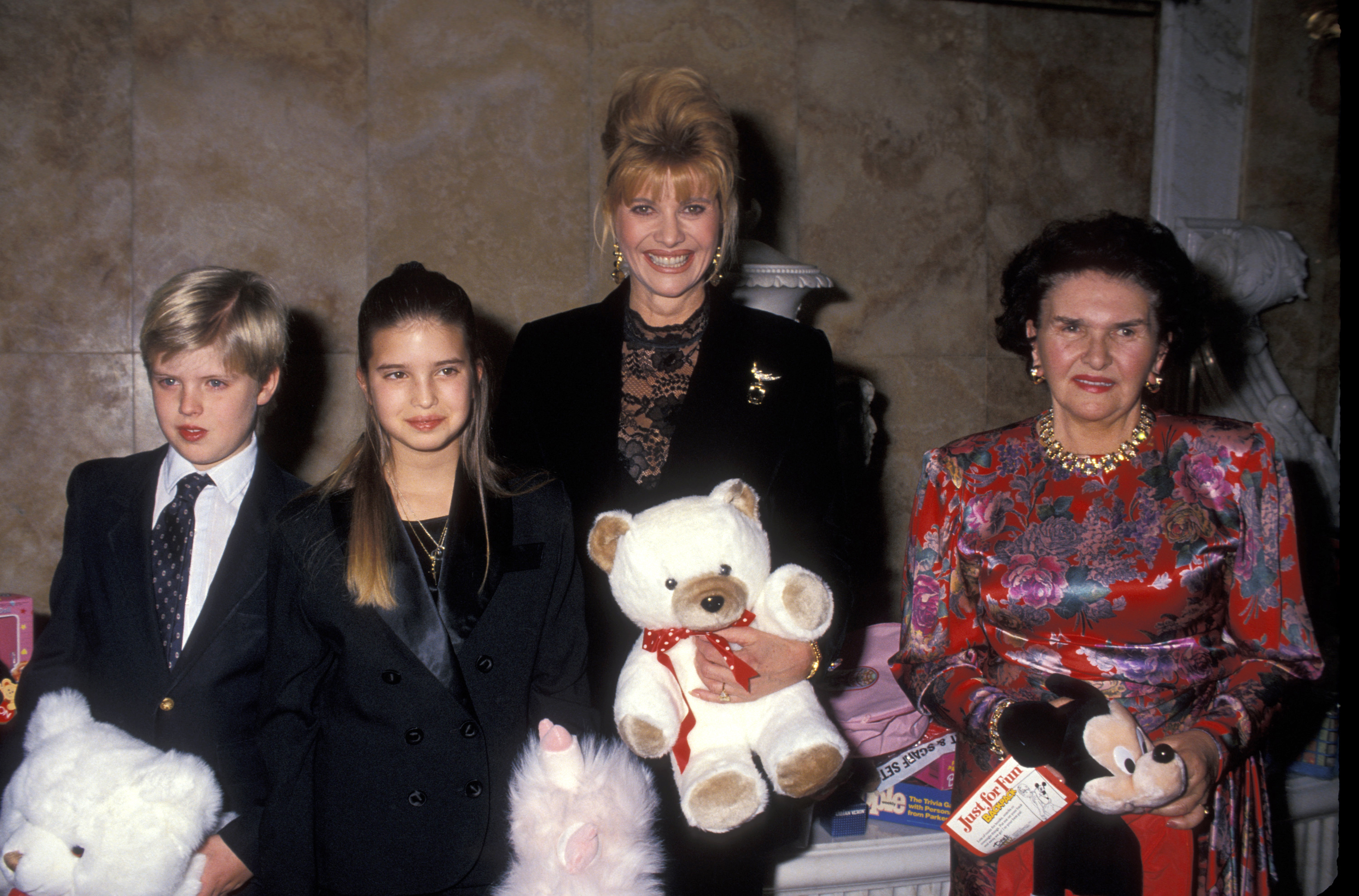 Eric Trump, Ivanka Trump, Ivana Trump, and Marie Zelnicekova attend the U.S. Marine Corps Reserves Toys for Tots "Toy Giving Party" on December 14, 1993 | Source: Getty Images