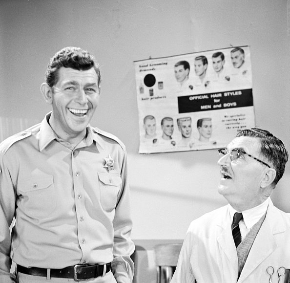Andy Griffith as Sheriff Andy Taylor and Howard McNear as barber Floyd Lawson in a scene from the television series "The Andy Griffith Show," circa 1966. | Photo: Getty Images