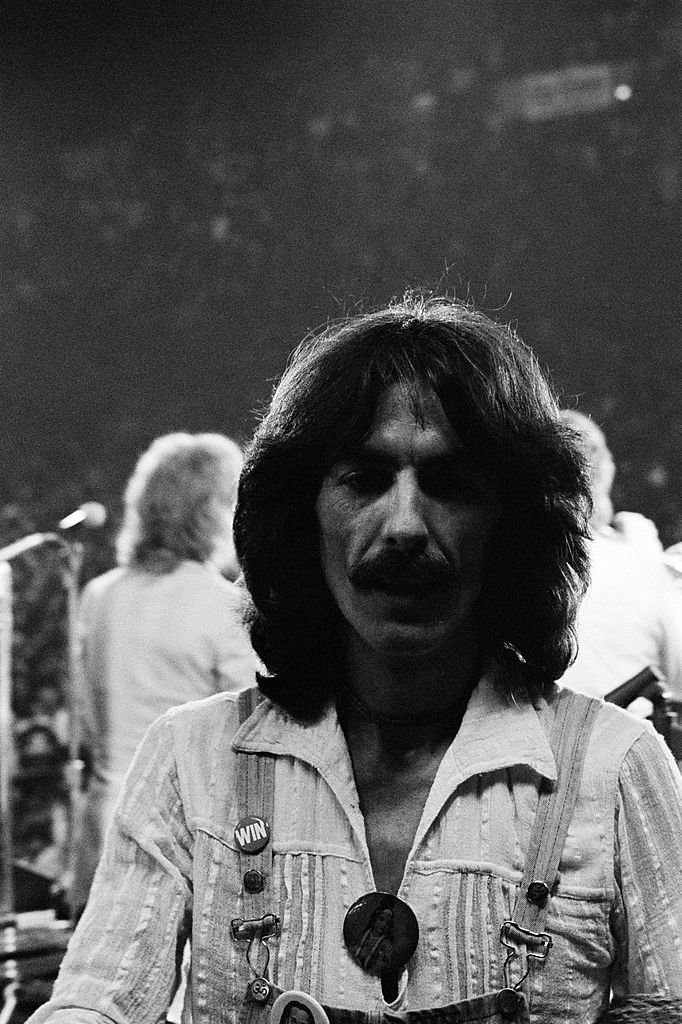 Singer/songwriter and former Beatles member, George Harrison performs on stage during his "North American Tour" | Getty Images / Global Images Ukraine Singer/songwriter and former Beatles member, George Harrison performs on stage during his "North American Tour" | Getty Images / Global Images Ukraine