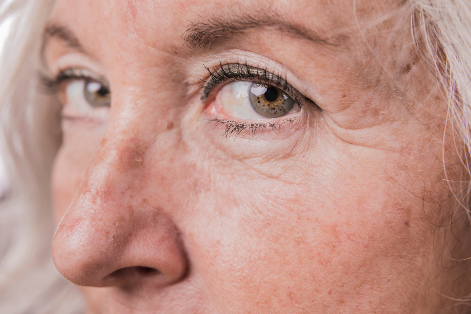 Close-up shot of an emotional senior woman | Source: Freepik