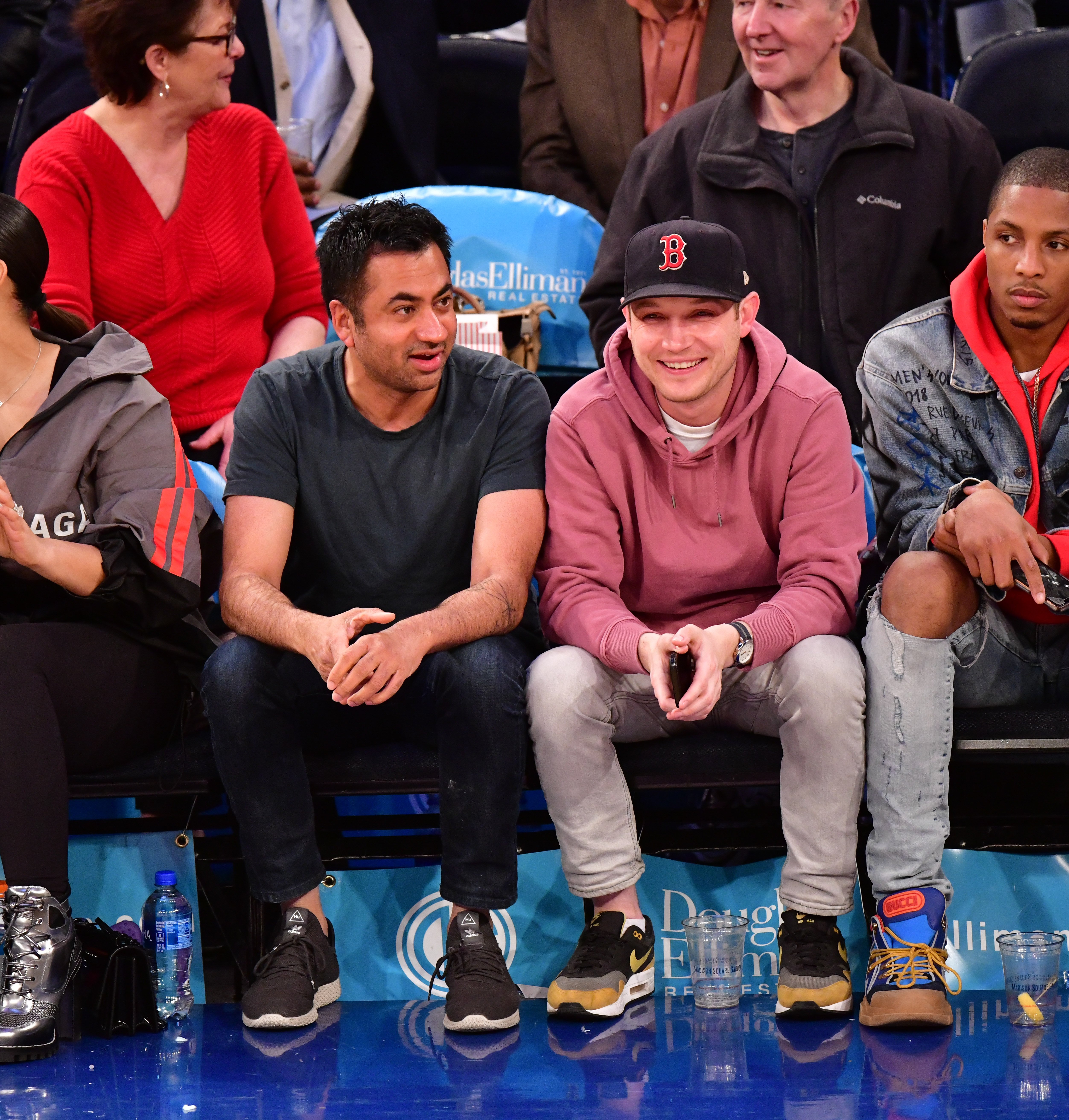 Kal Penn and his rumored fiance Josh watch the basketball game between Los Angeles Clippers and New York Knicks on March 24, 2019, in New York City. | Source: Getty Images