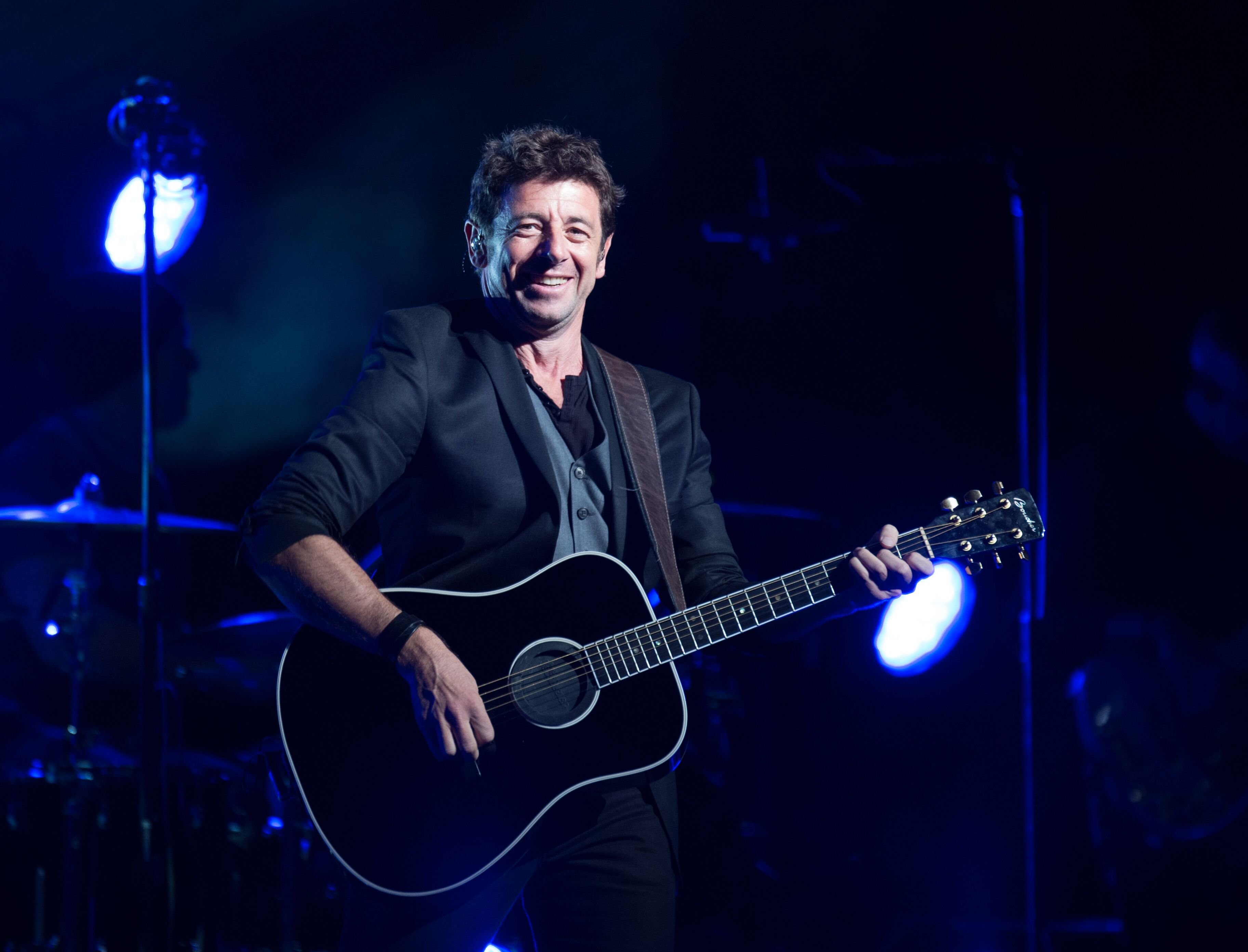 Le chanteur Patrick Bruel en concert. l Source : Getty Images