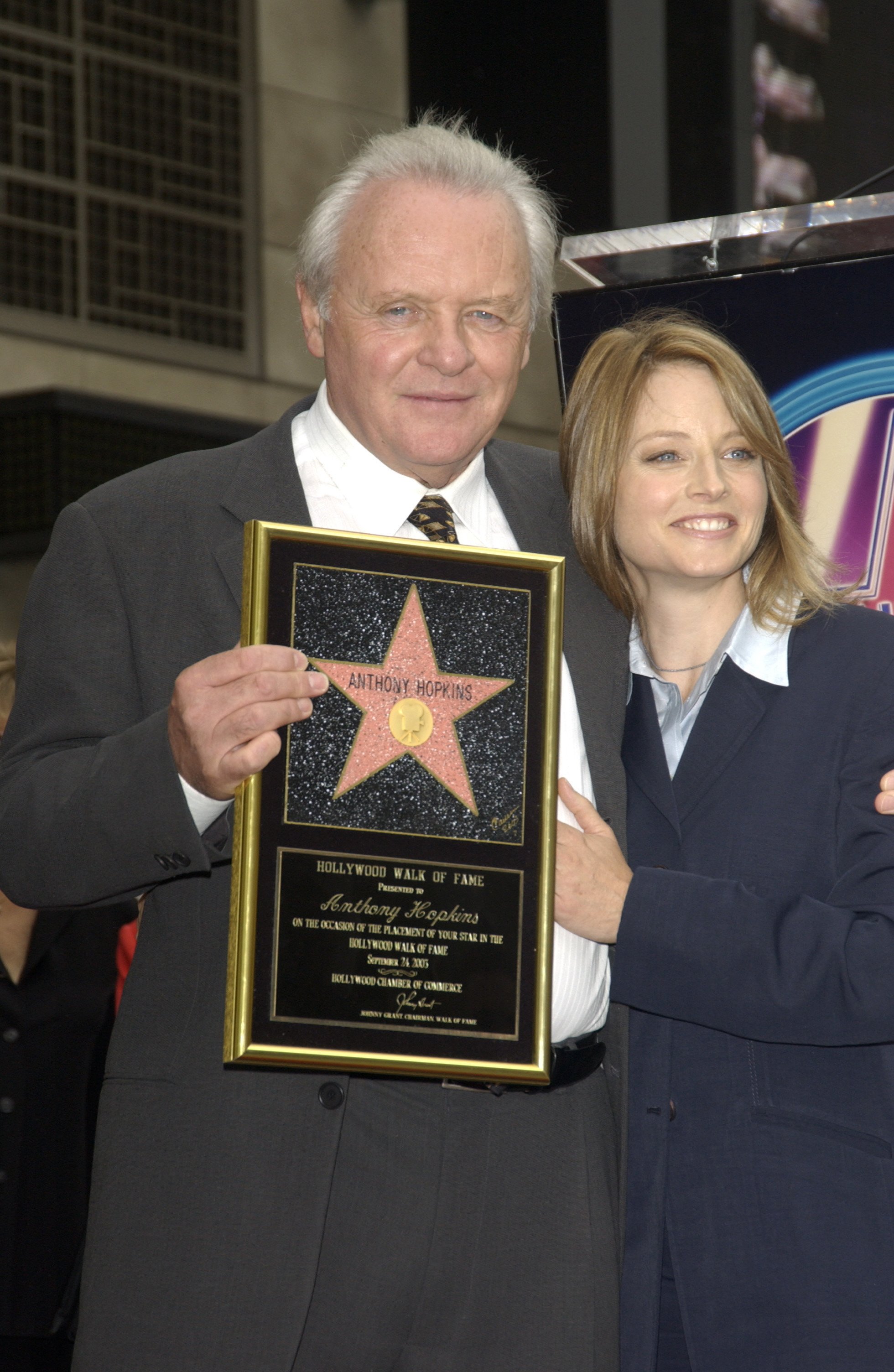 Sir Anthony Hopkins receiving his Hollywood Star honor, with actress, Jodie Hopkins September, 2003. | Photo: Shutterstock.