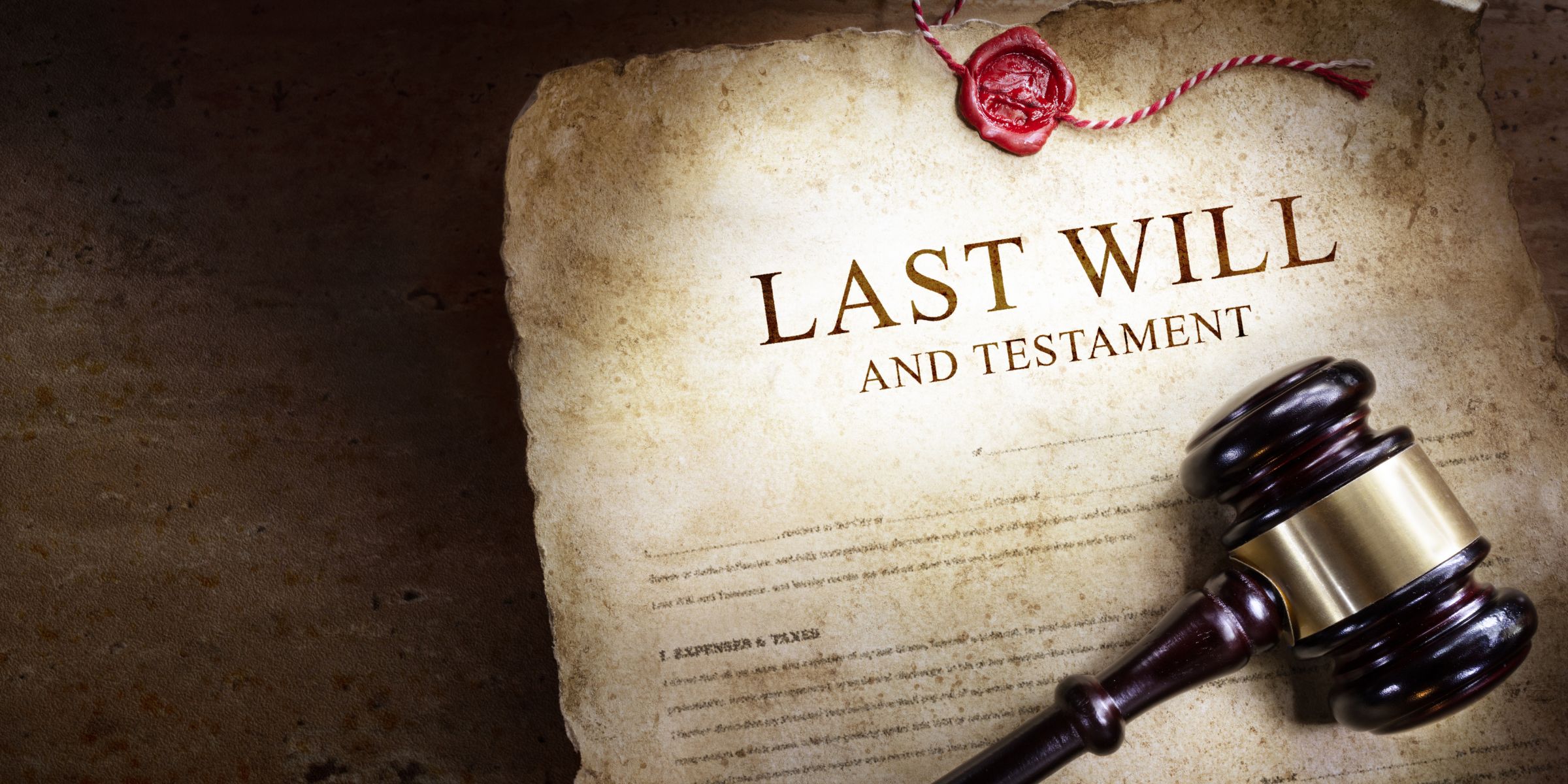 An old last will and testament with a gavel on top | Source: Shutterstock