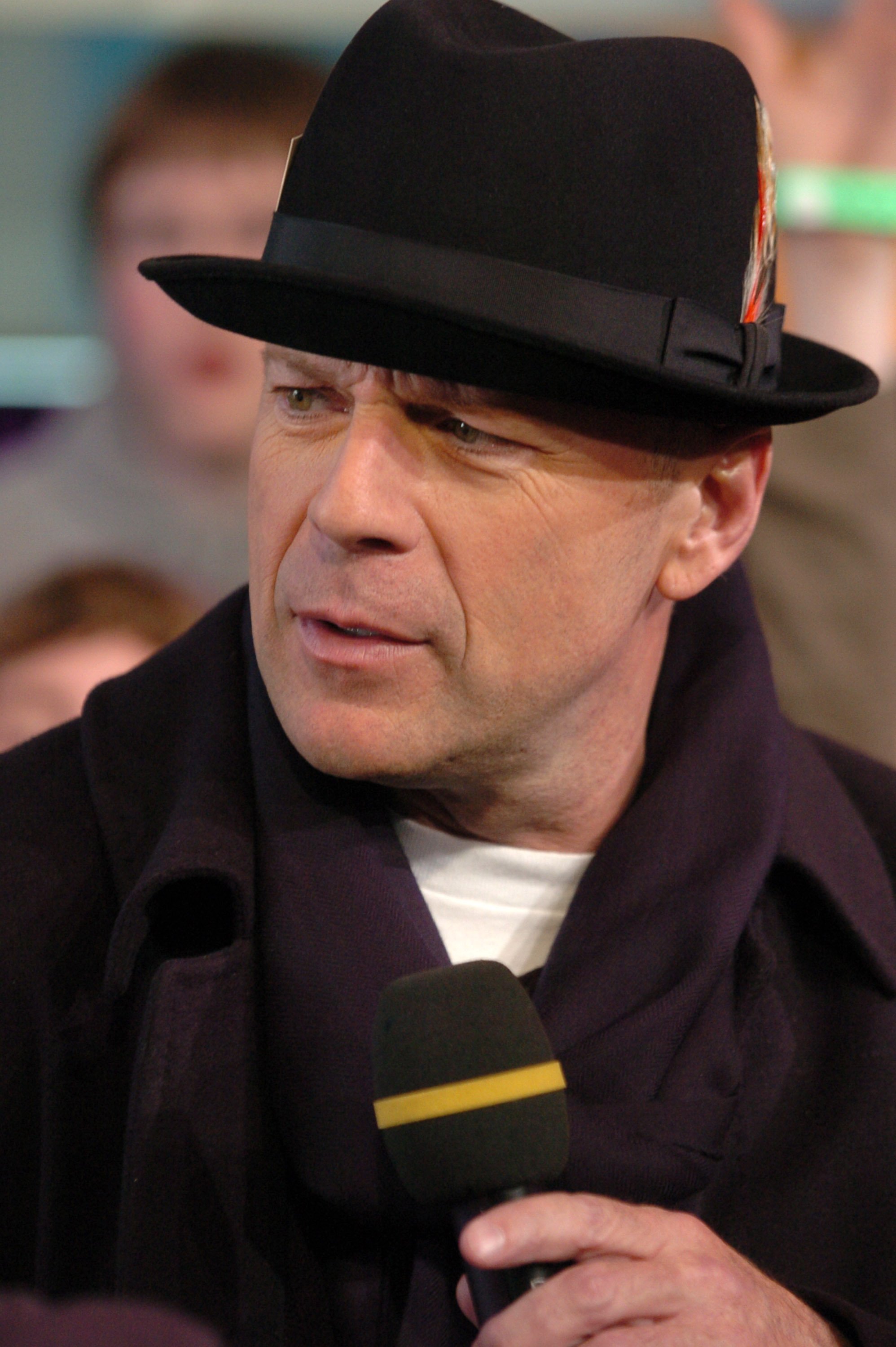 Bruce Willis during Bruce Willis, Matthew Perry and Switchfoot Visit MTV's "TRL" High School Week at MTV Studios, Times Square on April 5, 2004 in New York City, New York. / Source: Getty Images