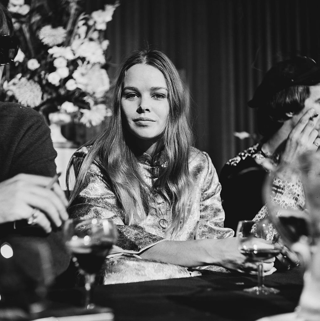 American singer and actress Michelle Phillips of American folk rock group The Mamas & The Papas at a press conference | Photo: Getty Images