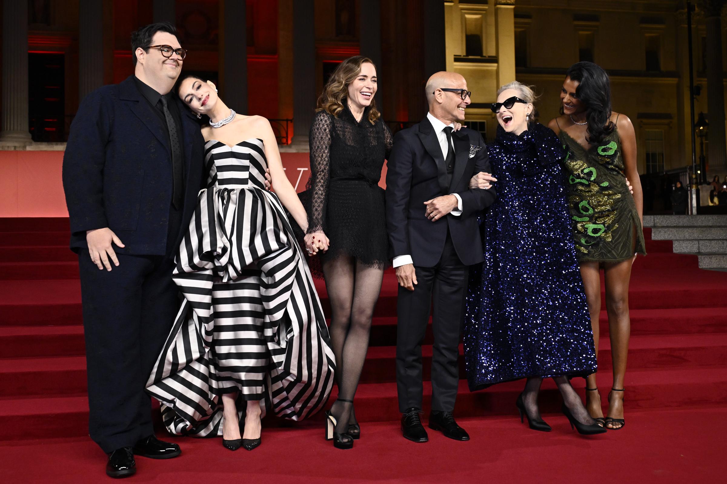 Caleb Hearon, Anne Hathaway, Emily Blunt, Stanley Tucci, Meryl Streep and Simone Ashley attend "A Night With Runway" Photocall for "The Devil Wears Prada 2" at The National Gallery on April 22, 2026 in London, England | Source: Getty Images