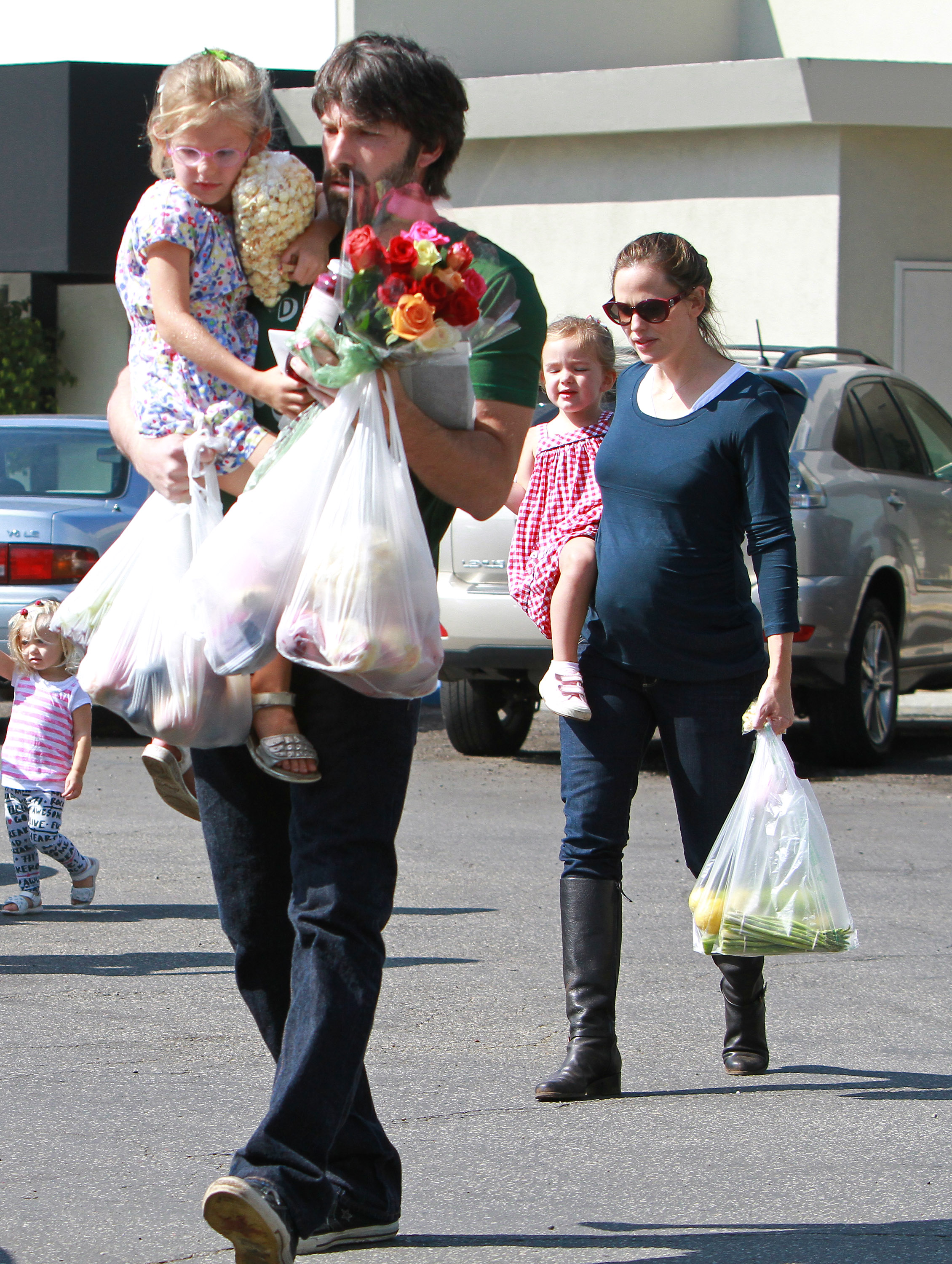 Ben Affleck and Jennifer Garner seen with their children on October 16, 2011 | Source: Getty Images