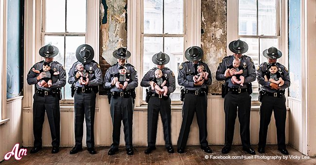 Photo shoot of seven 'Brothers In Blue' and their babies