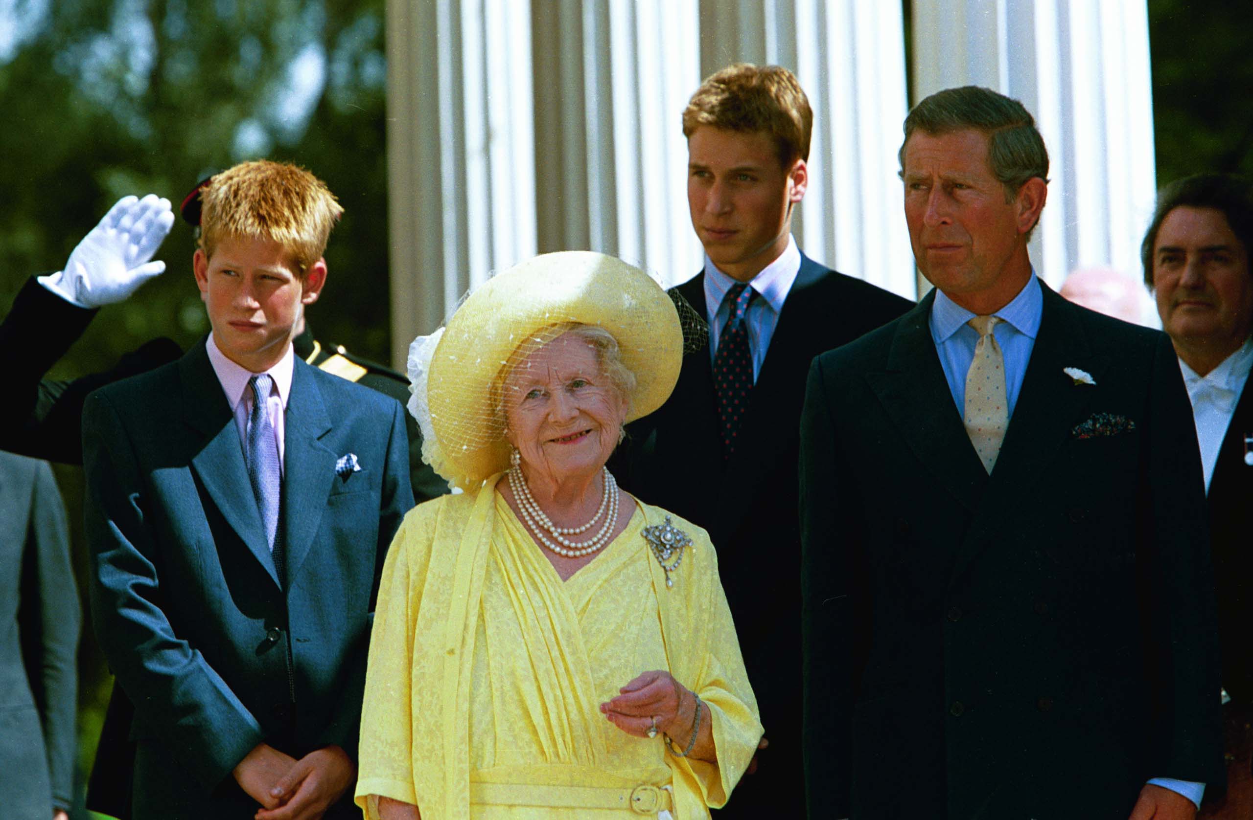 The Queen Mother with great grandsons Princes Harry & William & grandson King Charles on her 99th birthday in August 1999 | Source: Getty Images