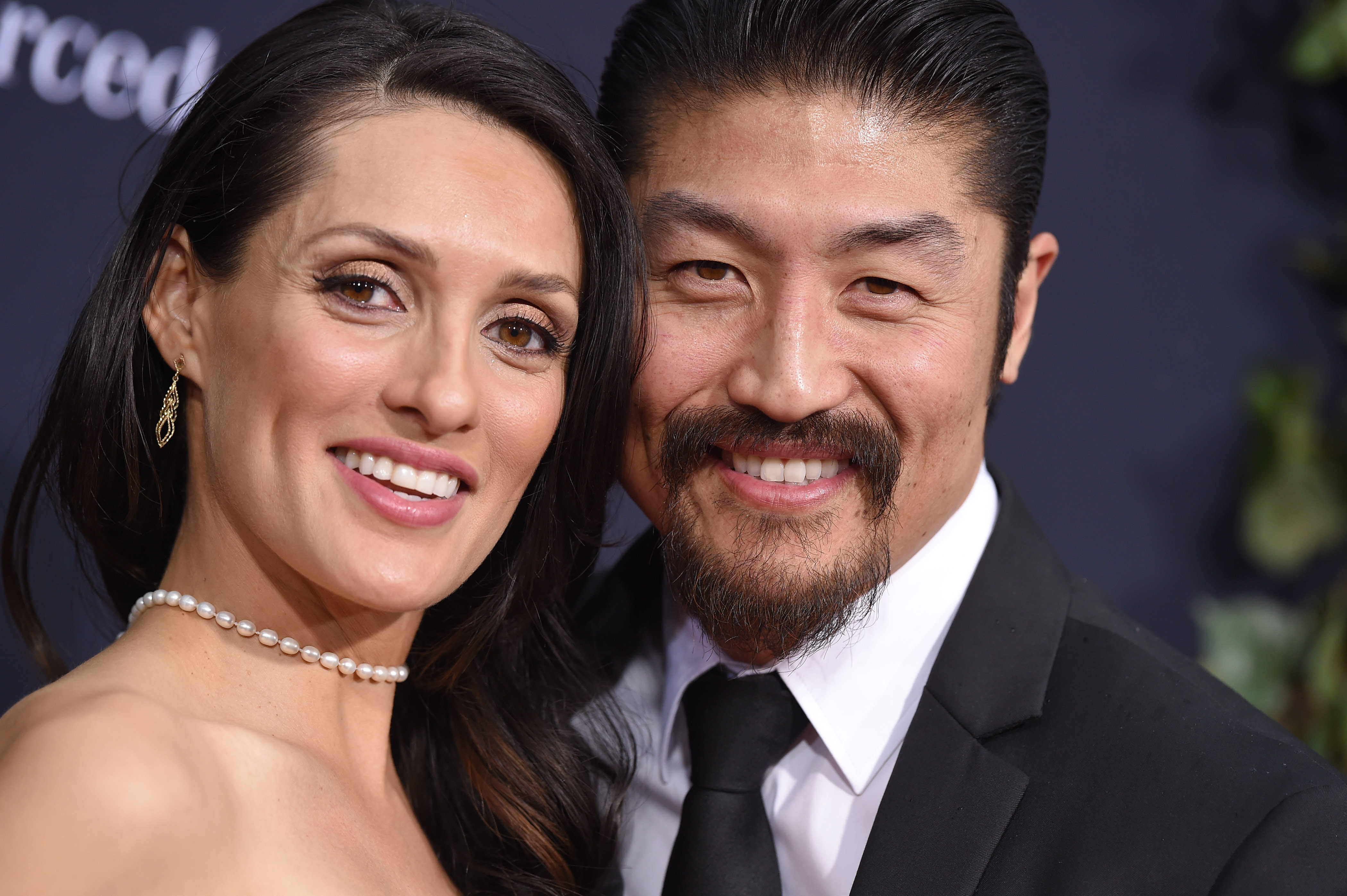 Brian Tee and Mirelly Taylor at the world premiere of 'Jurassic World' in 2015, in Hollywood. | Source: Getty Images