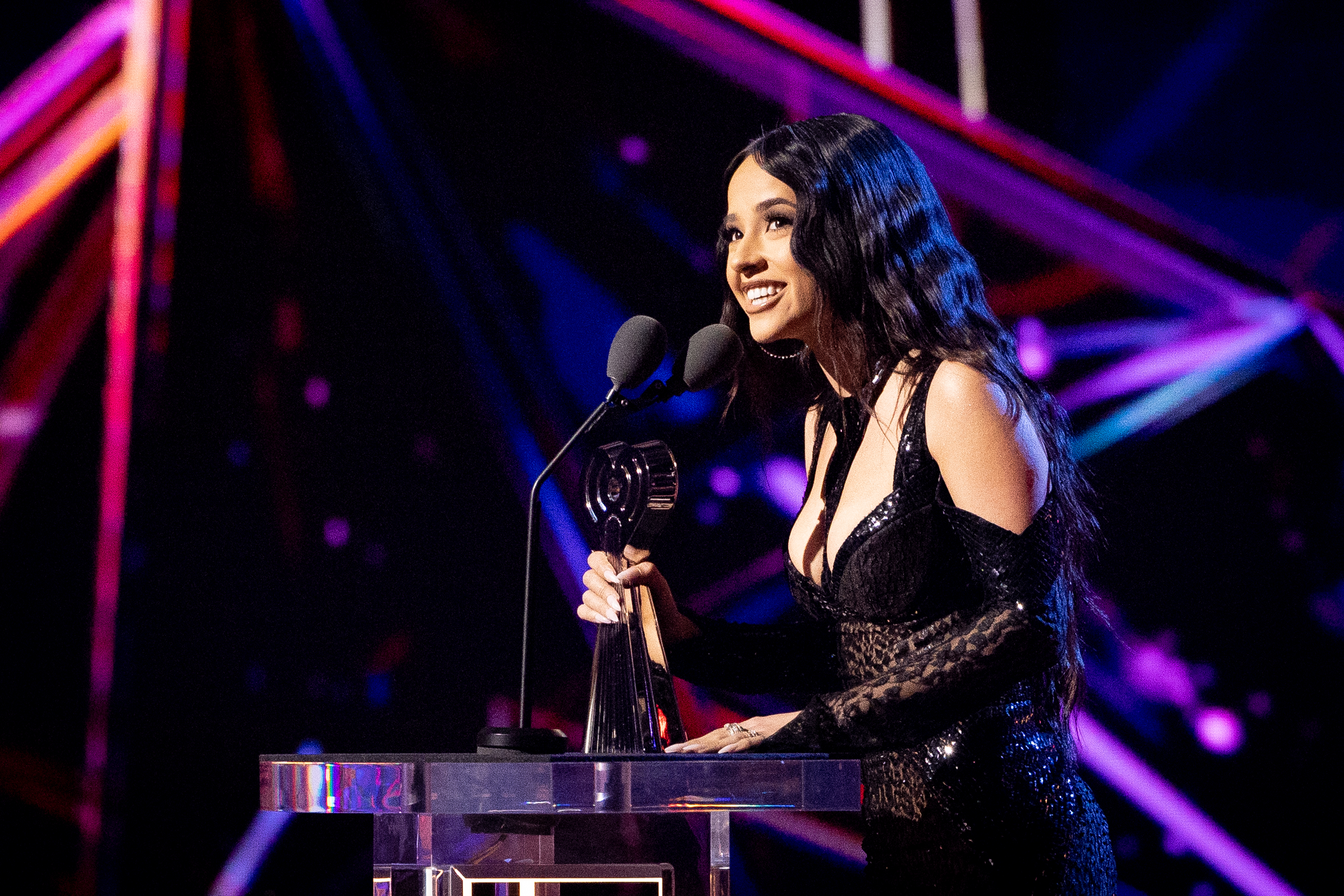 Becky G wins the Latin Pop/Reggaeton Song Of The Year for “MAMIII” award onstage at the 2023 iHeartRadio Music Awards at Dolby Theatre in Los Angeles, California, on March 27, 2023. | Source: Getty Images
