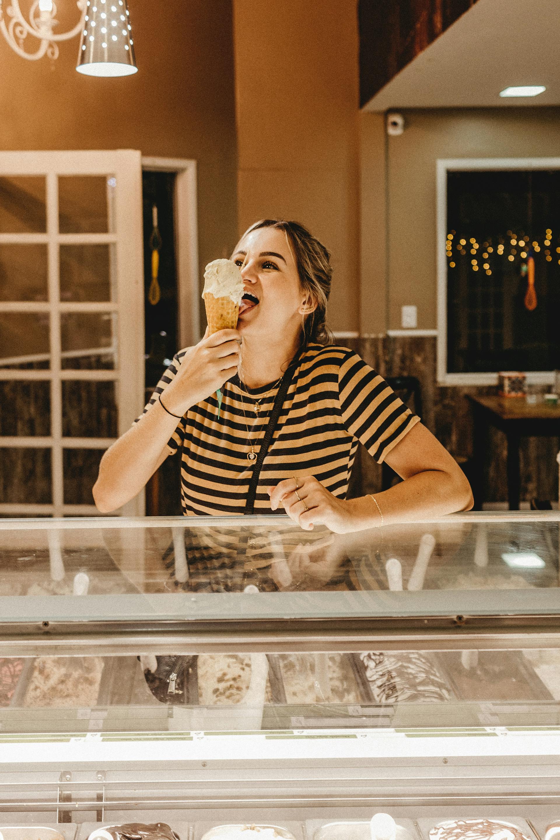 A woman enjoying an ice cream cone | Source: Pexels