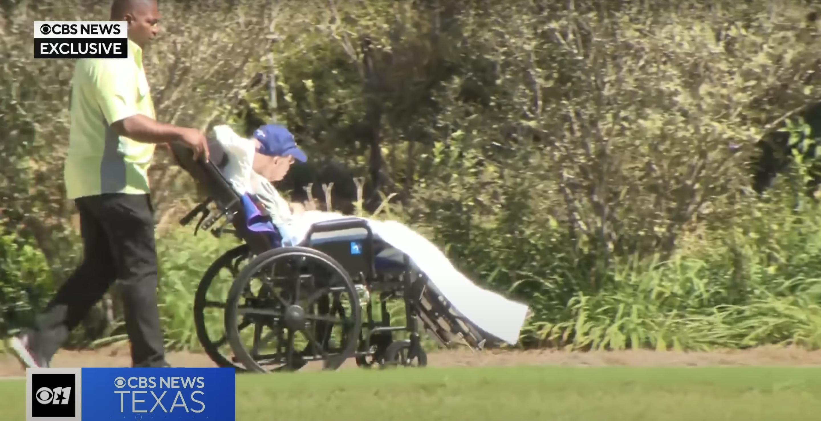 An aide wheels Jimmy Carter outdoors at a hospice in Plains, Georgia, posted on October 2, 2024. | Source: YouTube.com/CBSDFW