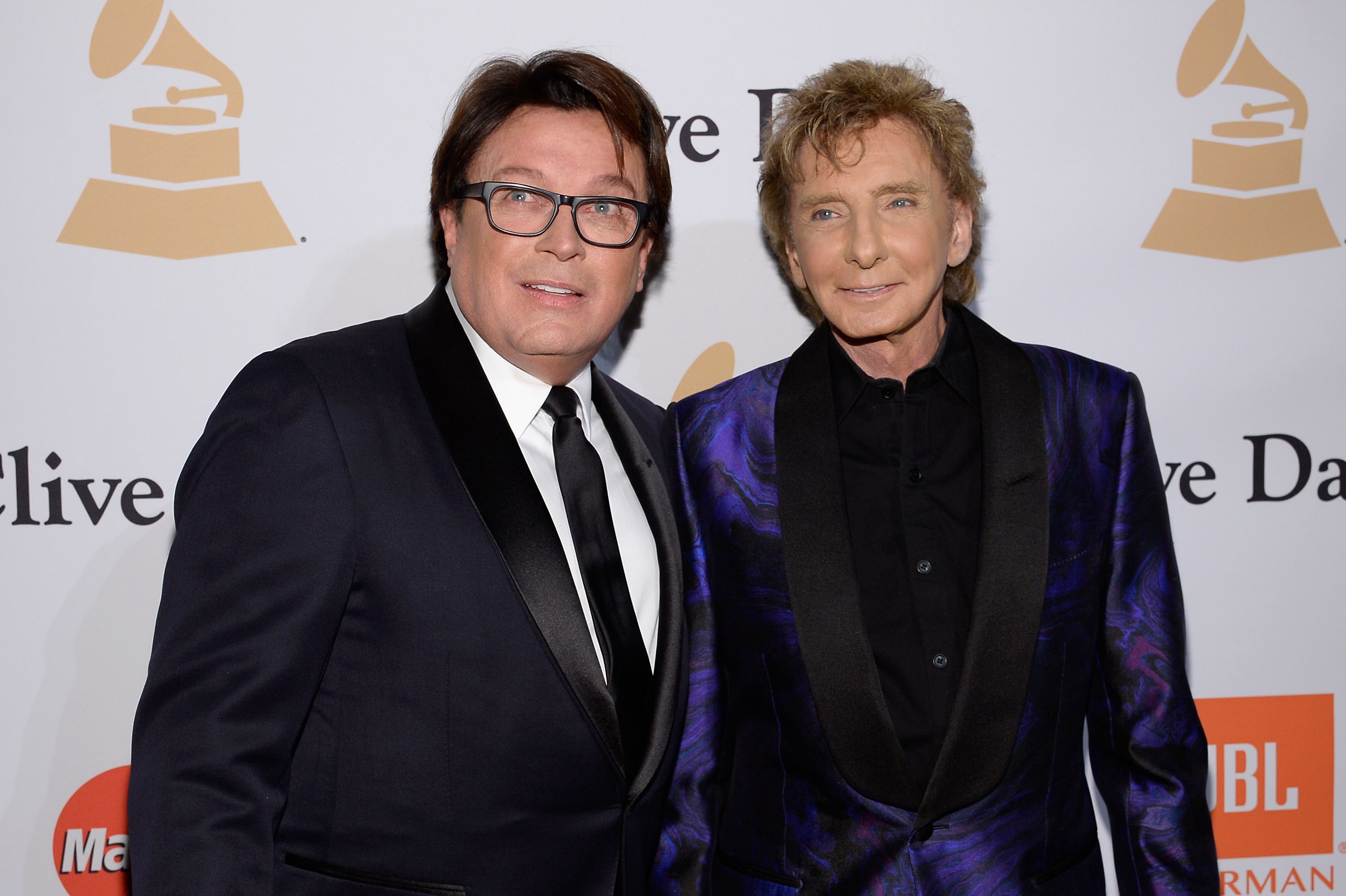Garry Kief and Barry Manilow attend the 2016 Pre-GRAMMY Gala on February 15, 2016. | Source: Getty Images