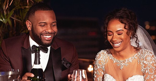 Miles and Karen from Lifetime’s show, “Married at First Sight” chat during their wedding reception | Source: Instagram/mafslifetime