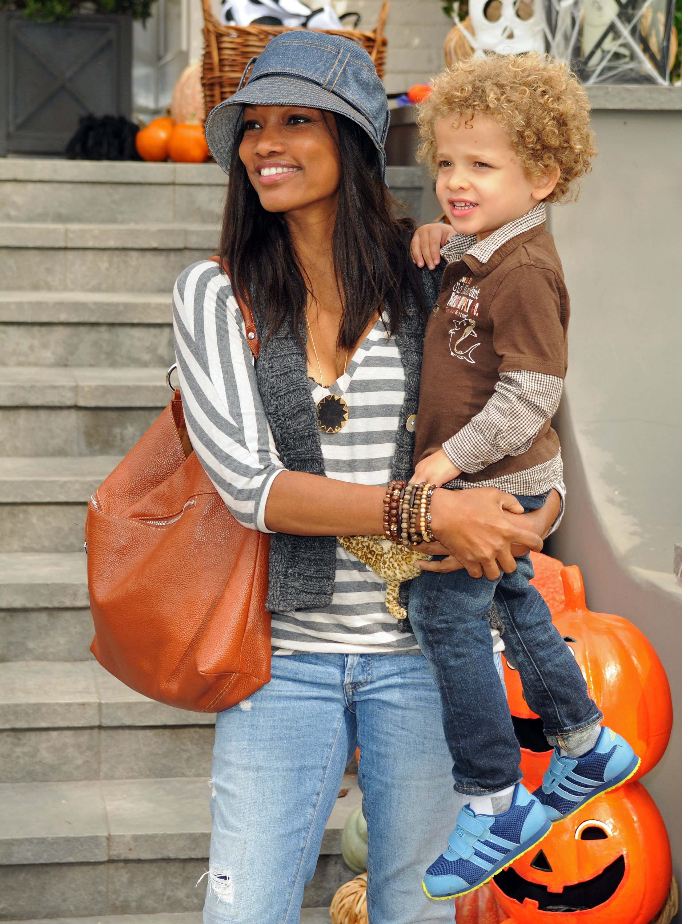 Garcelle Beauvais and her son, Jax Nilon at the Pottery Barn Kids' Halloween Carnival on October 23, 2010. | Source: Getty Images