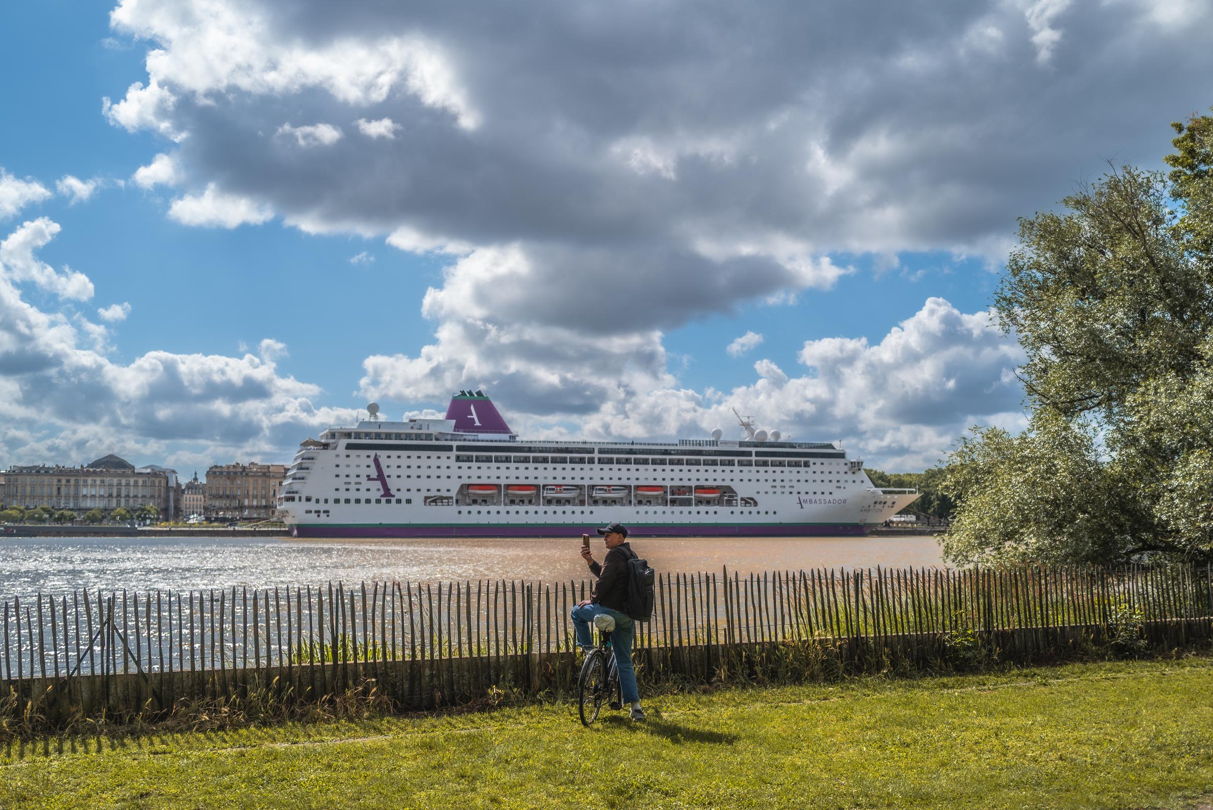 The cruise ship Ambition operated by Ambassador Cruise Line remains immobilized in the port of Bordeaux after several cases of acute gastrointestinal illness were reported among passengers and crew members in Bordeaux, Nouvelle Aquitaine, France, May 13, 2026. | Source: Getty Images