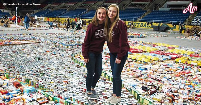 Students fill the floor of the Fargodome stadium with donated food for the needy this holiday