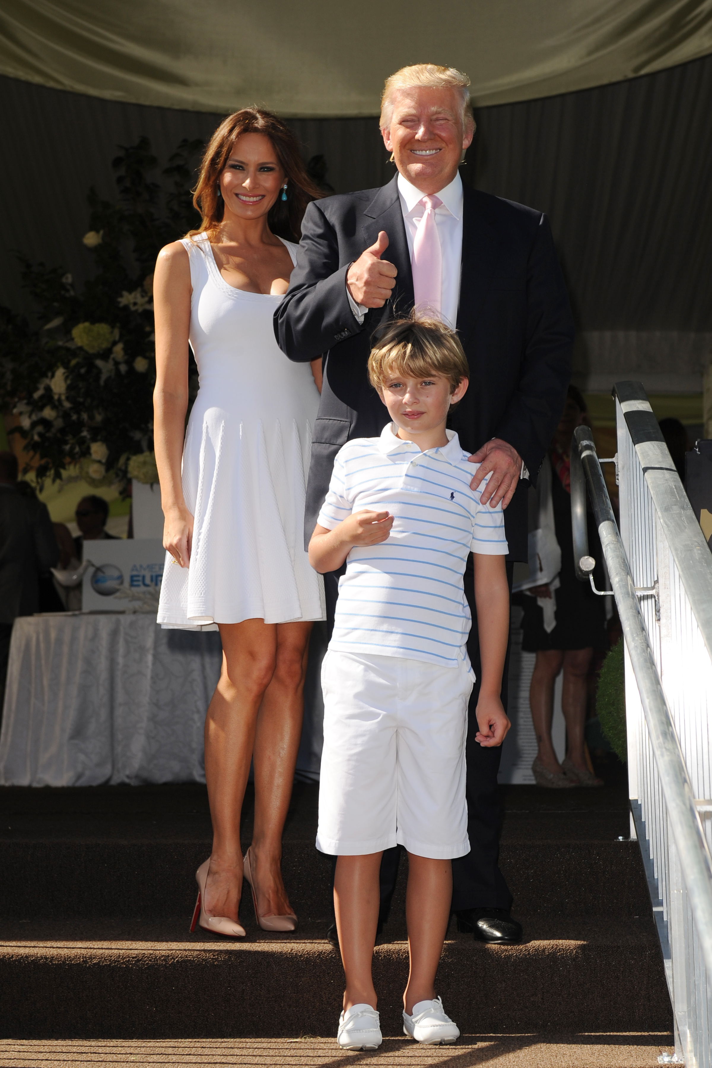 Donald, Melania, and Barron Trump at the Trump Invitational Grand Prix at Mar-a-Lago on January 6, 2013, in Palm Beach, Florida. | Source: Getty Images