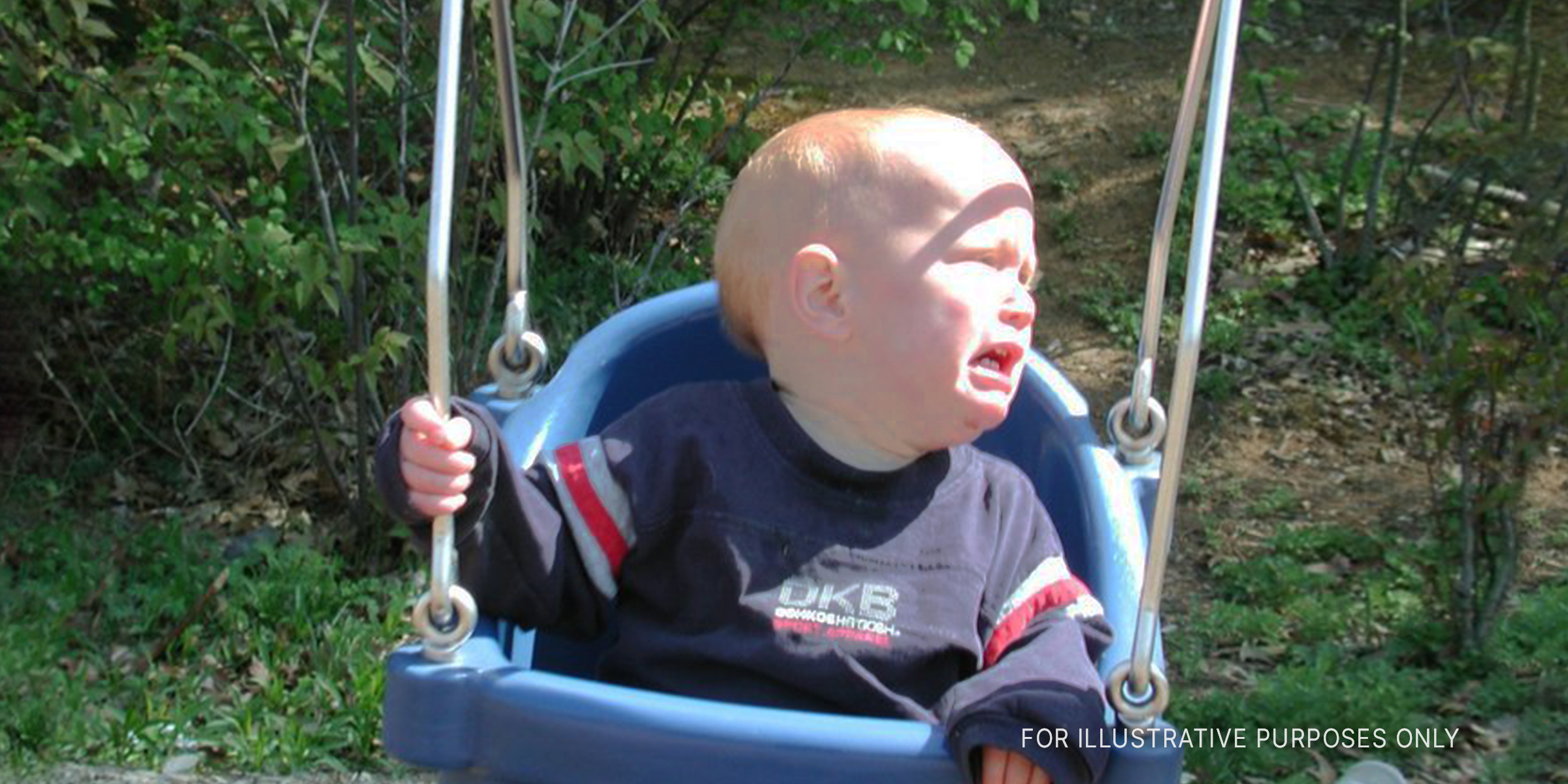 A baby crying on the swing | Source: Flickr/subewl (CC BY-SA 2.0)