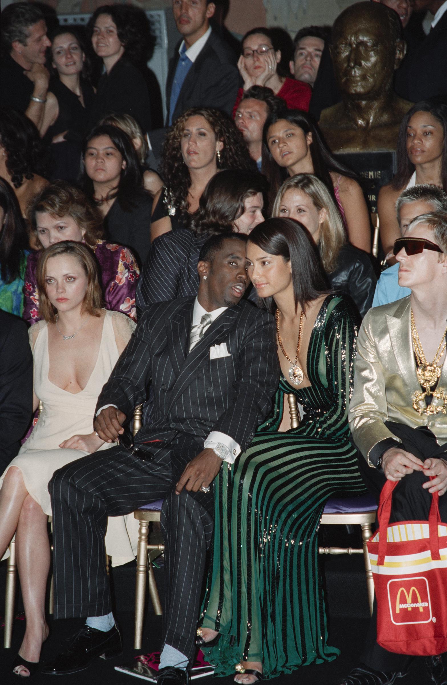 Emma Heming Willis and P. Diddy are at Autumn-Winter Versace fashion show in Paris on July 7, 2001 | Source: Getty Images