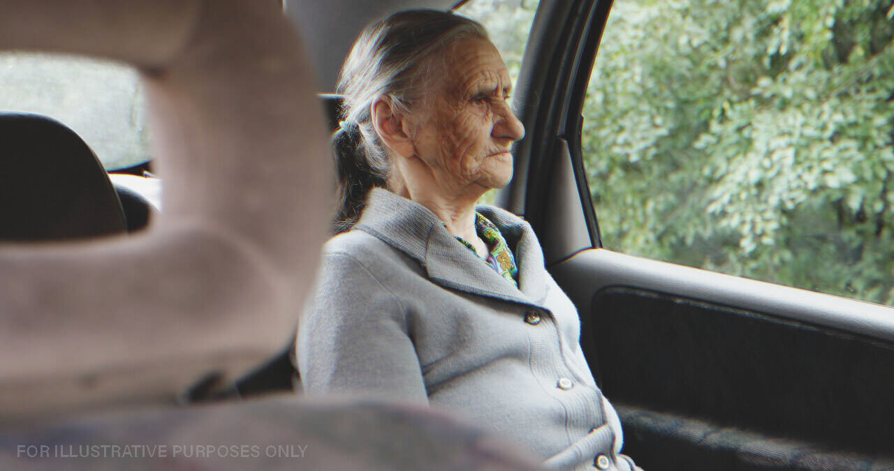 Old Lady Looking Out Car Window. | Source: Shutterstock