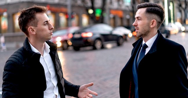 Two men are talking. | Photo: Shutterstock