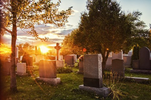 Sunrise over a cemetery. | Source: Shutterstock.