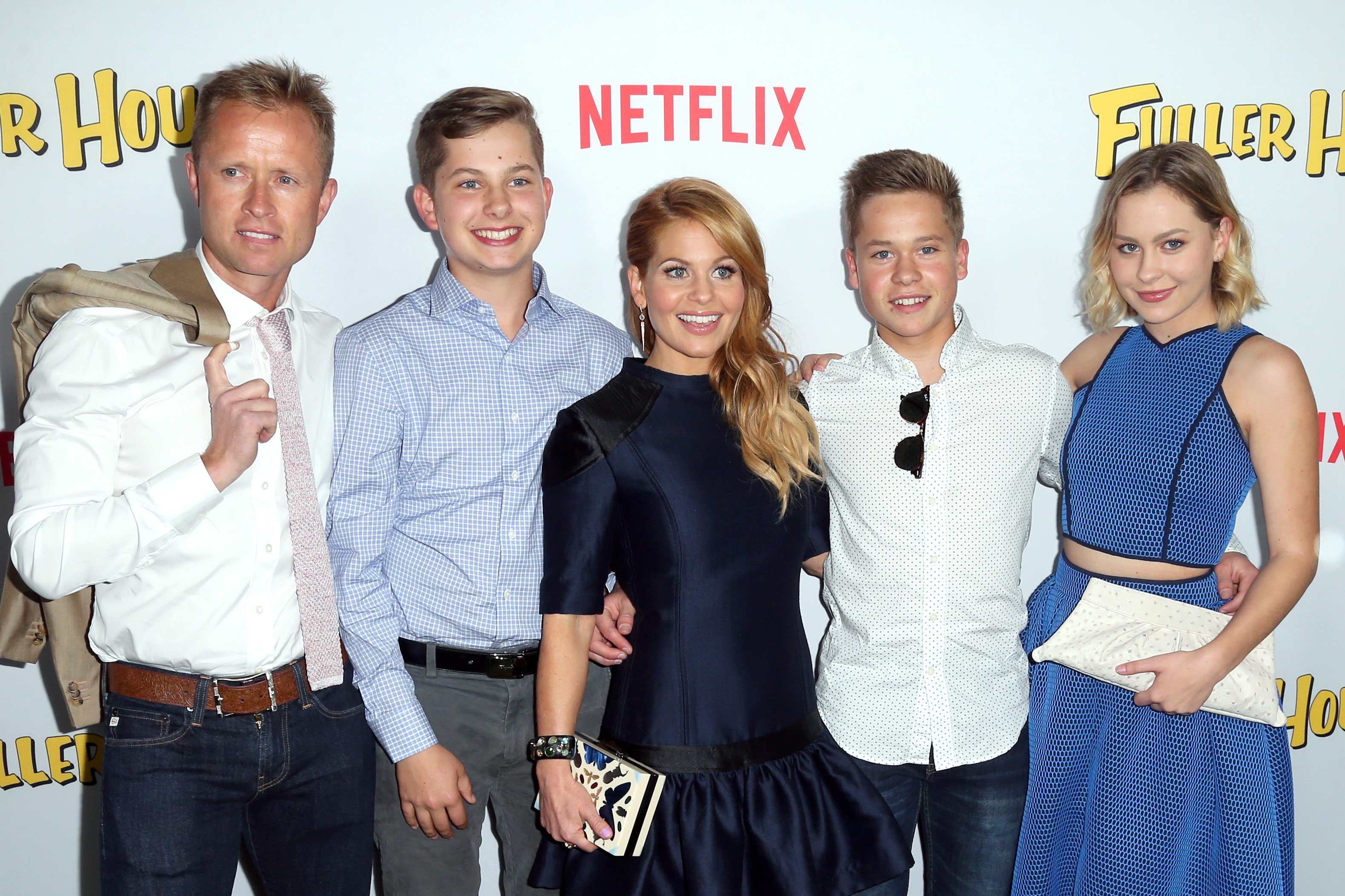 Actress Candace Cameron Bure [Center] with her husband Valerie Bure [Far Left], her sons Lev and Maksim and daughter Natasha. | Source: Getty Images