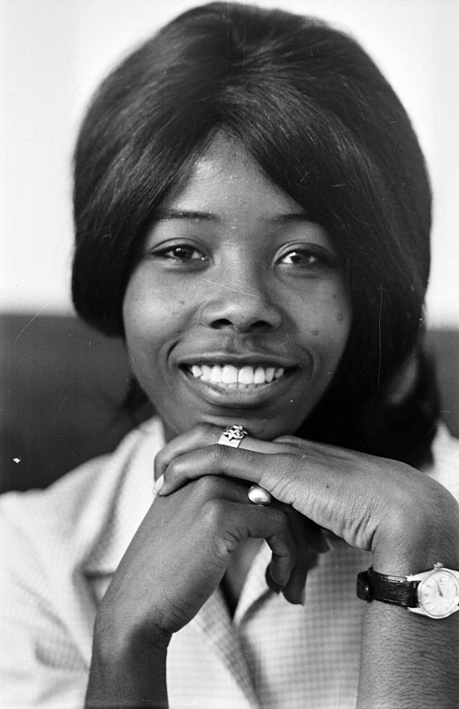 Millie Small, poses for a portrait at 16-years-old after scoring a hit with her song "My Boy Lollipop" on October 5, 1965 | Source Michael Stroud/Express/Getty Images